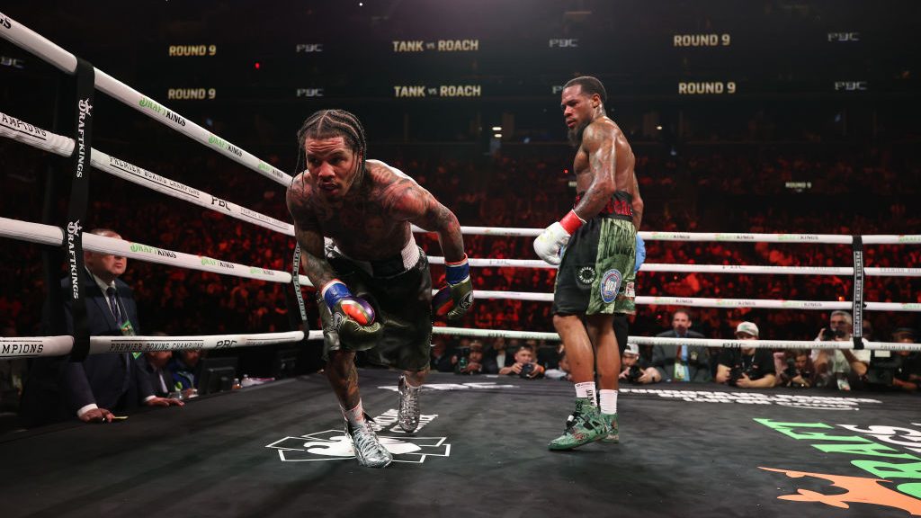 Gervonta Davis takes a knee in the middle of round nine due to the grease in his braids dripped into his eyes against Lamont Roach Jr. during their bout for Davis' WBA lightweight title at Barclays Center on March 01, 2025 in New York City. (