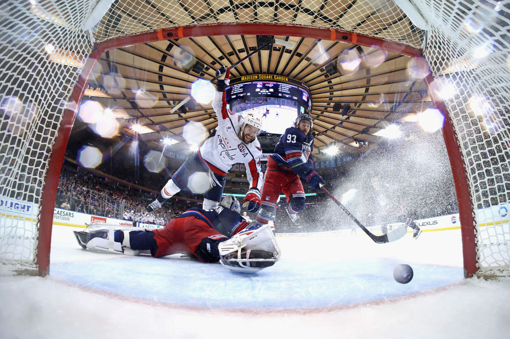 Tom Wilson #43 of the Washington Capitals scores in overtime