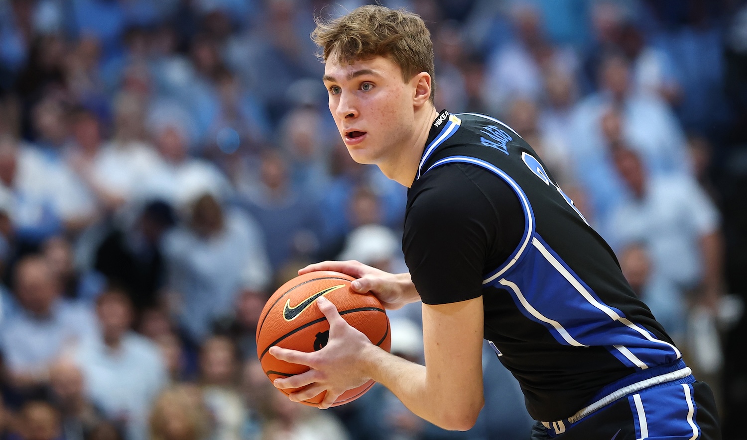 CHAPEL HILL, NORTH CAROLINA - MARCH 08: Cooper Flagg #2 of the Duke Blue Devils looks over the court during the first half of the game against the North Carolina Tar Heels at Dean E. Smith Center on March 08, 2025 in Chapel Hill, North Carolina. (Photo by Jared C. Tilton/Getty Images)