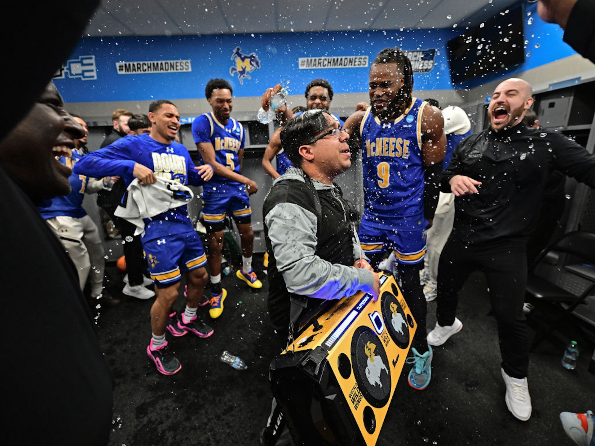 The McNeese Cowboys celebrate their win over the Clemson University Tigers during the first round of the 2025 NCAA Men’s Basketball Tournament held at Amica Mutual Pavillion on March 20, 2025 in Providence, Rhode Island.