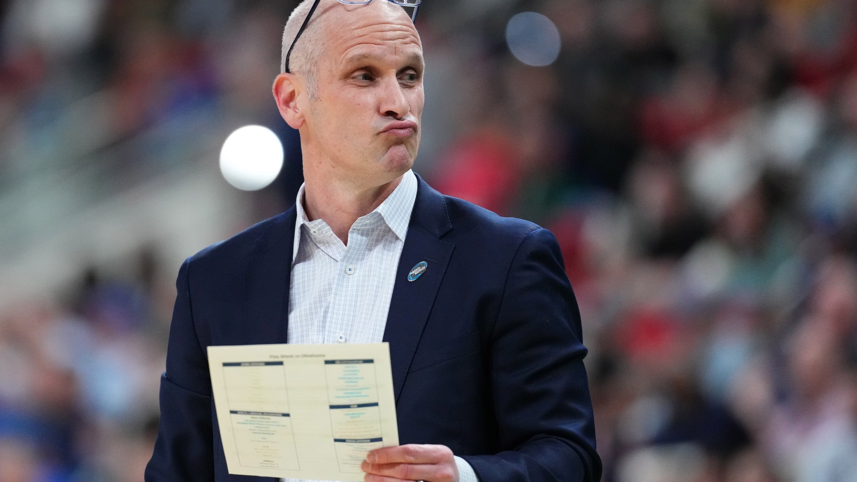 Dan Hurley making a skeptical face with his glasses pushed up onto his forehead during UConn's loss to Florida in the second round of the 2025 NCAA Tournament.