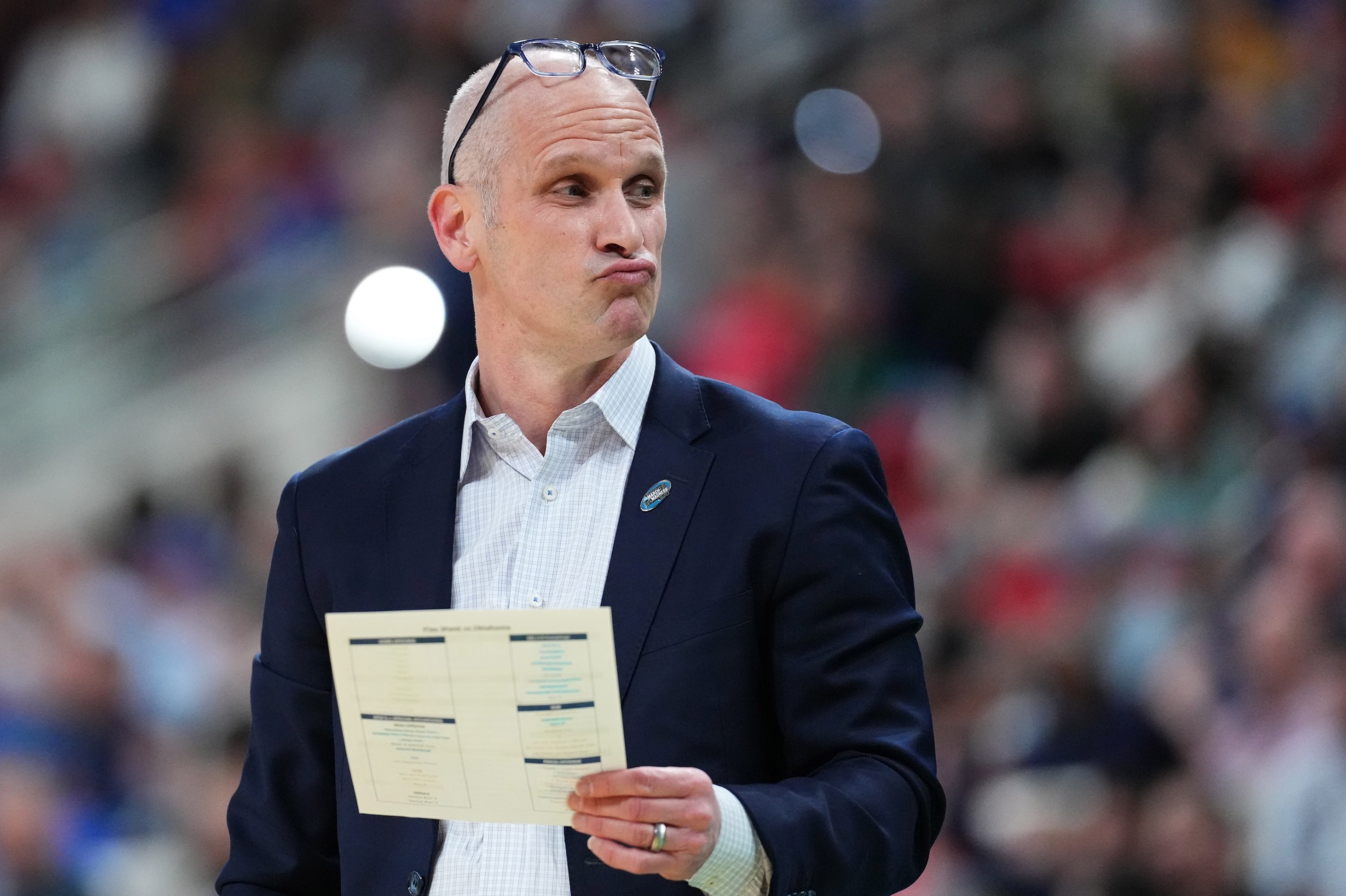 Dan Hurley making a skeptical face with his glasses pushed up onto his forehead during UConn's loss to Florida in the second round of the 2025 NCAA Tournament.