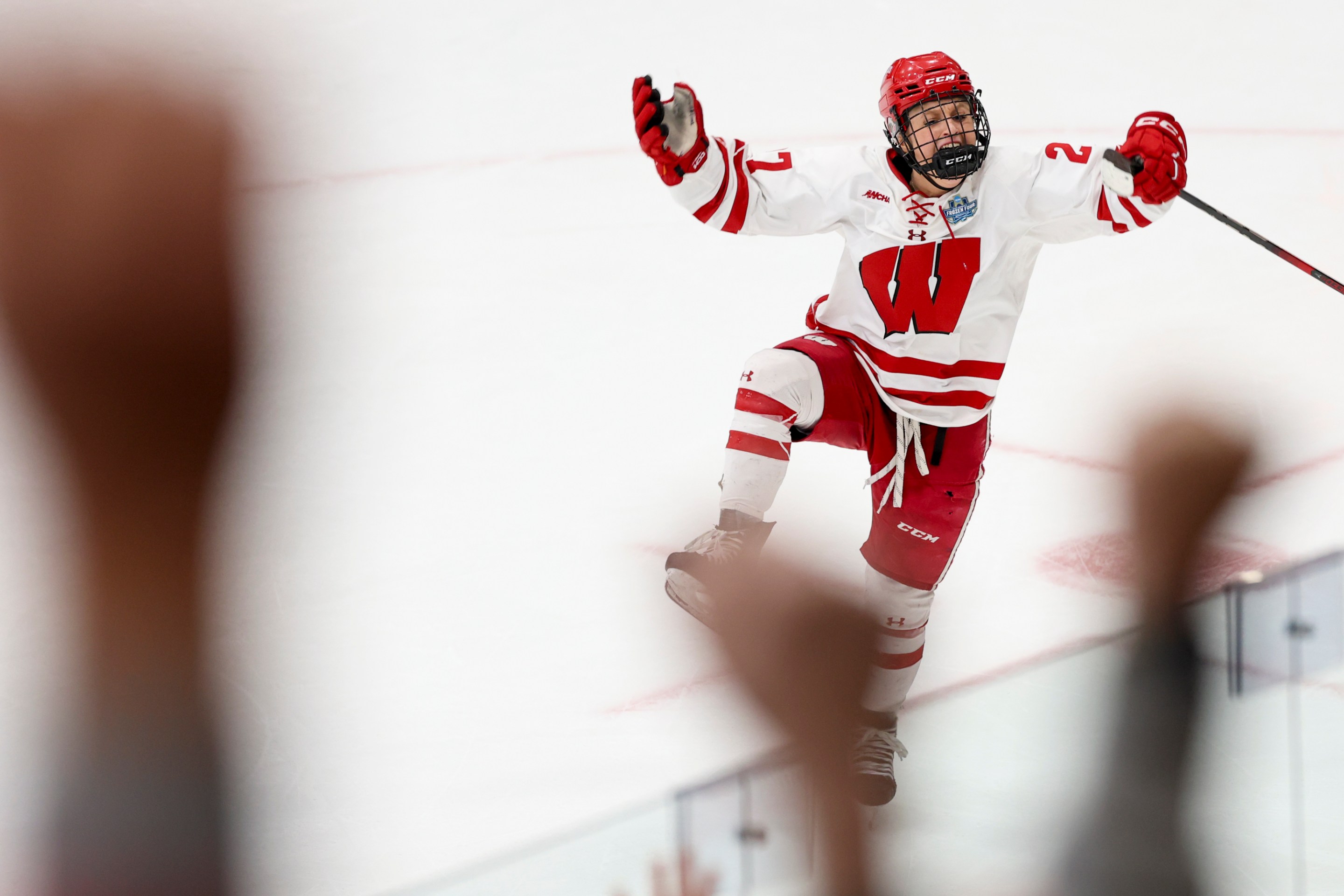 Kirsten Simms #27 of the Wisconsin Badgers celebrates after scoring a goal off a penalty shot during the third period of the Division I Women's Ice Hockey Championship game against the Ohio State Buckeyes held at Ridder Arena on March 23, 2025 in Minneapolis, Minnesota.