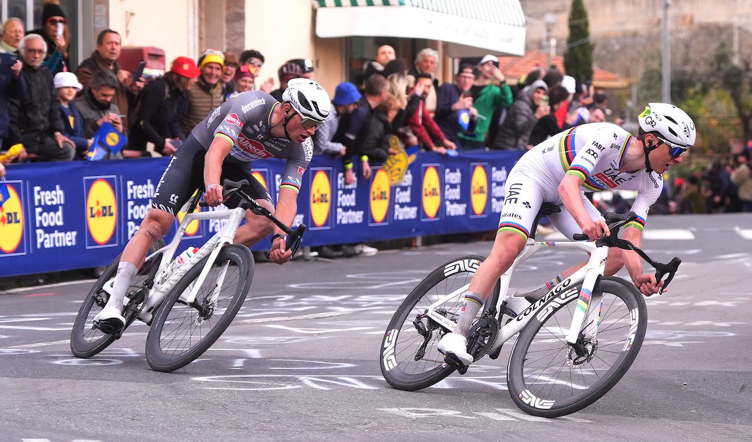 SANREMO, ITALY - MARCH 22: (L-R) Mathieu Van Der Poel of Netherlands and Team Alpecin – Deceuninck and Tadej Pogacar of Slovenia and Team UAE Team Emirates compete in the breakaway during the 116th Milano-Sanremo 2025 a 289km one day race from Pavia to Sanremo / #UCIWT / on March 22, 2025 in Sanremo, Italy. (Photo byFabio Ferrari - Pool/Getty Images)