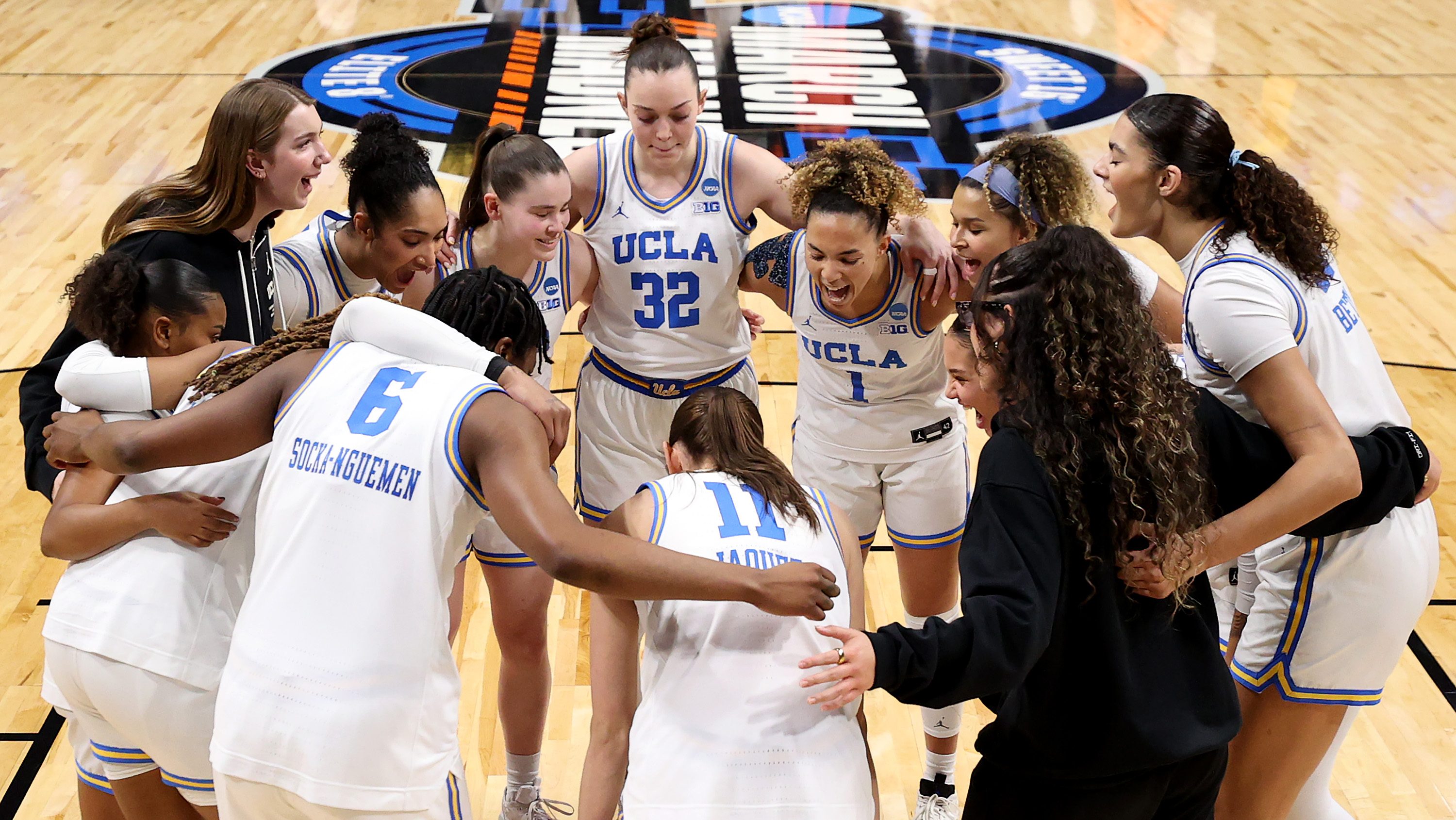 UCLA Bruins gathers against the LSU Lady Tigers during the Elite Eight round of the NCAA Women's Basketball Tournament at Spokane Arena on March 30, 2025 in Spokane, Washington.