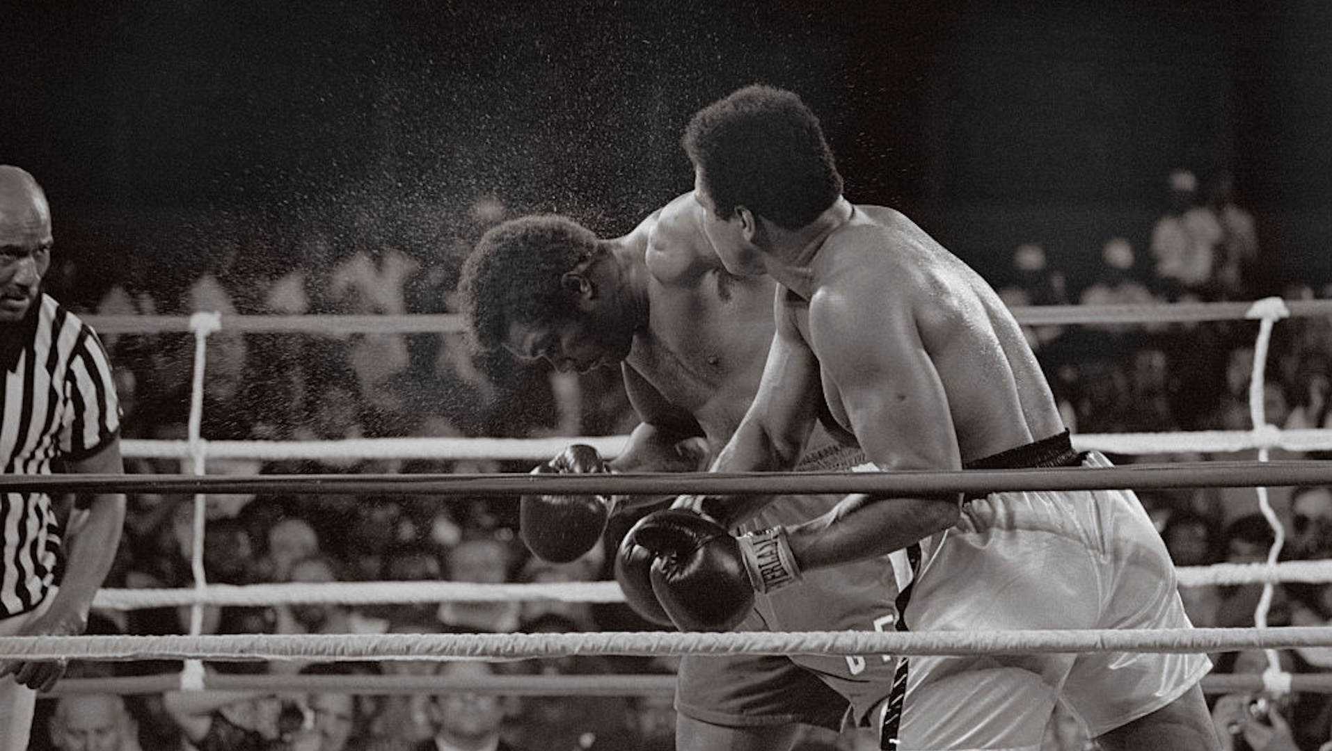 Muhammad Ali smashes a right to the head of George Foreman.