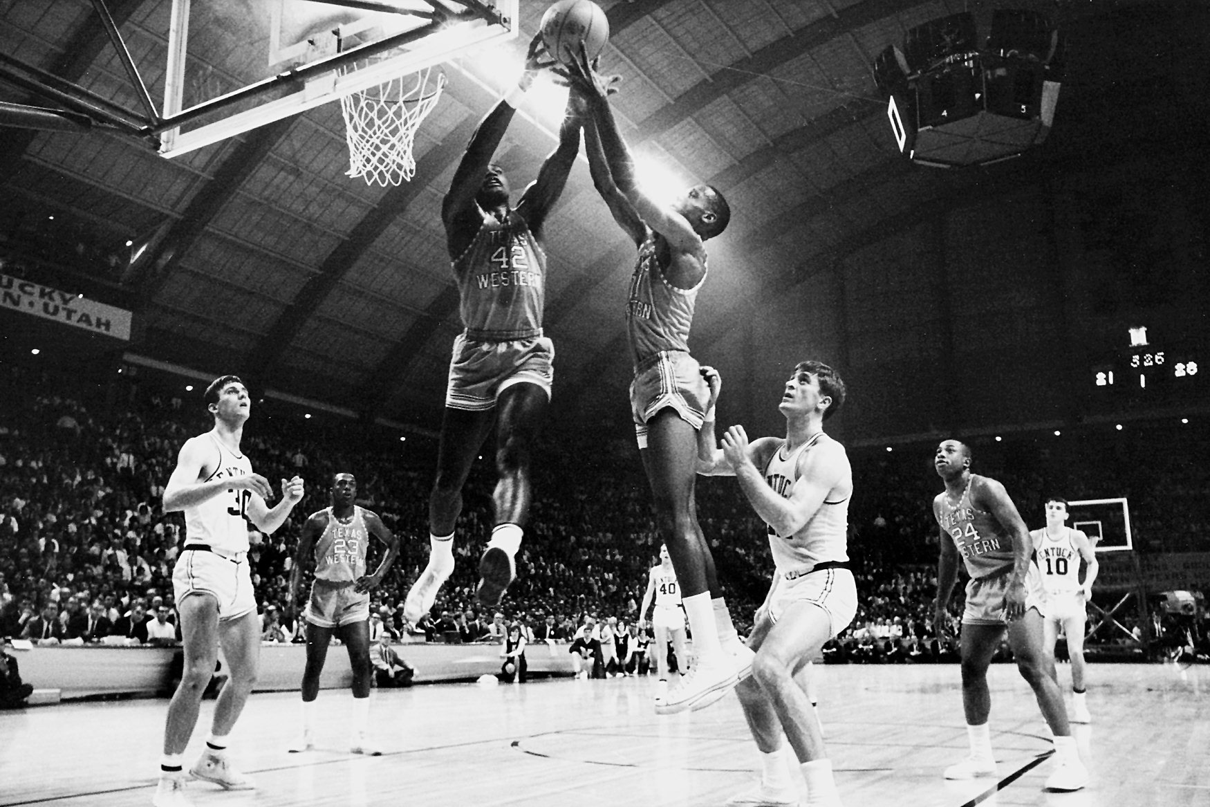 David Lattin (42) and a Texas Western teammate compete for control of a rebound as Kentucky's Tommy Kron, left, and Pat Riley , right, look on during the 1966 NCAA Photos via Getty Images Championship. Texas Western defeated Kentucky 72-65 for the championship title and was the first team to have an.. all-.black starting five compete in the NCAA final
