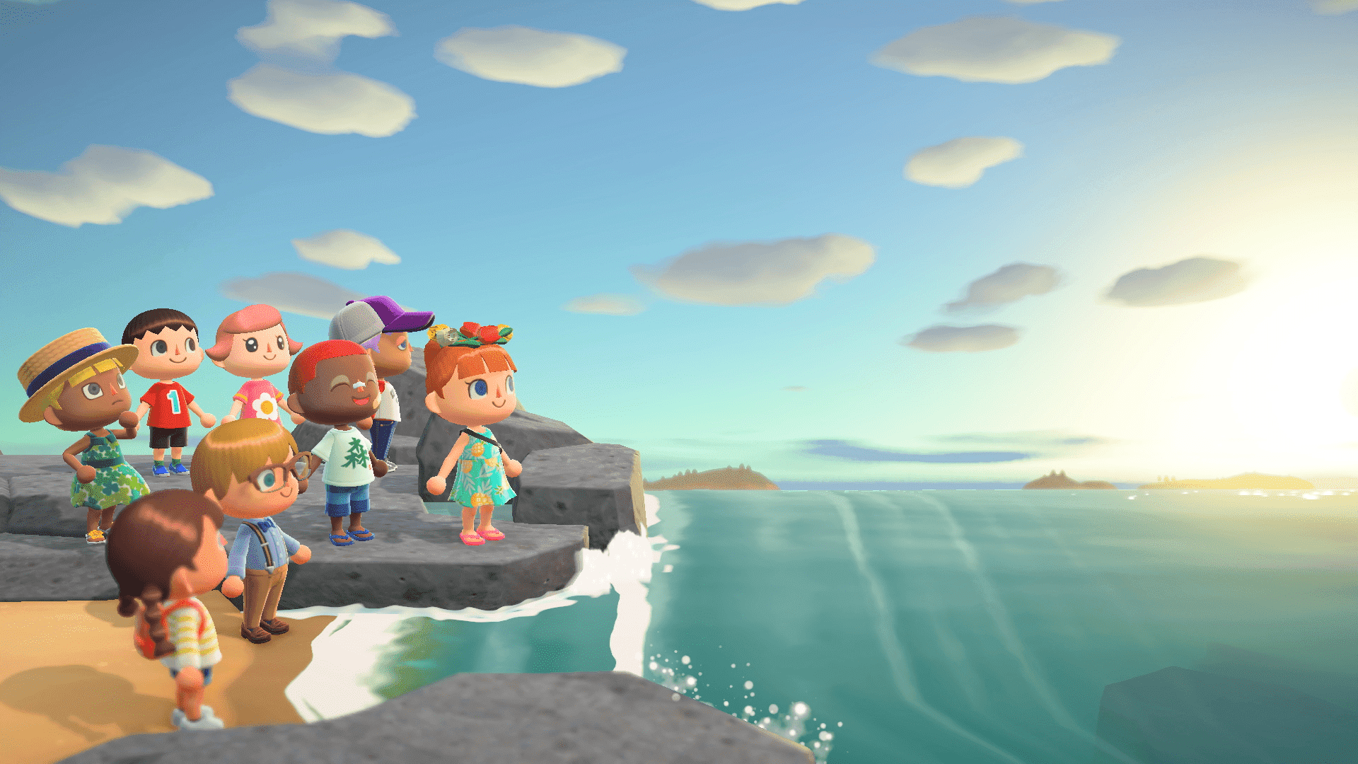 Villagers stand on a rock looking at the ocean in Animal Crossing: New Horizons