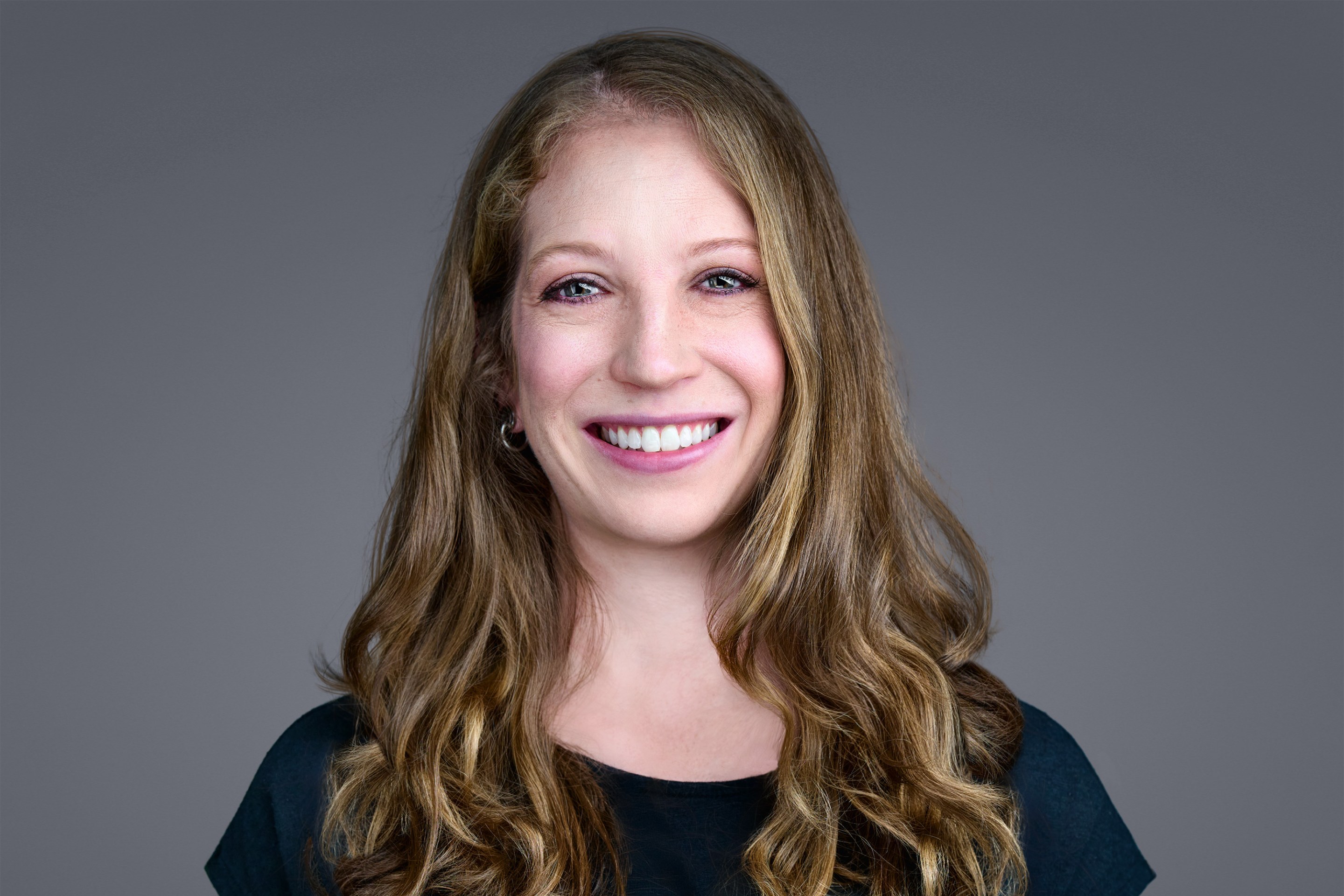 a headshot of fired CDC health communications manager Sarah Boim