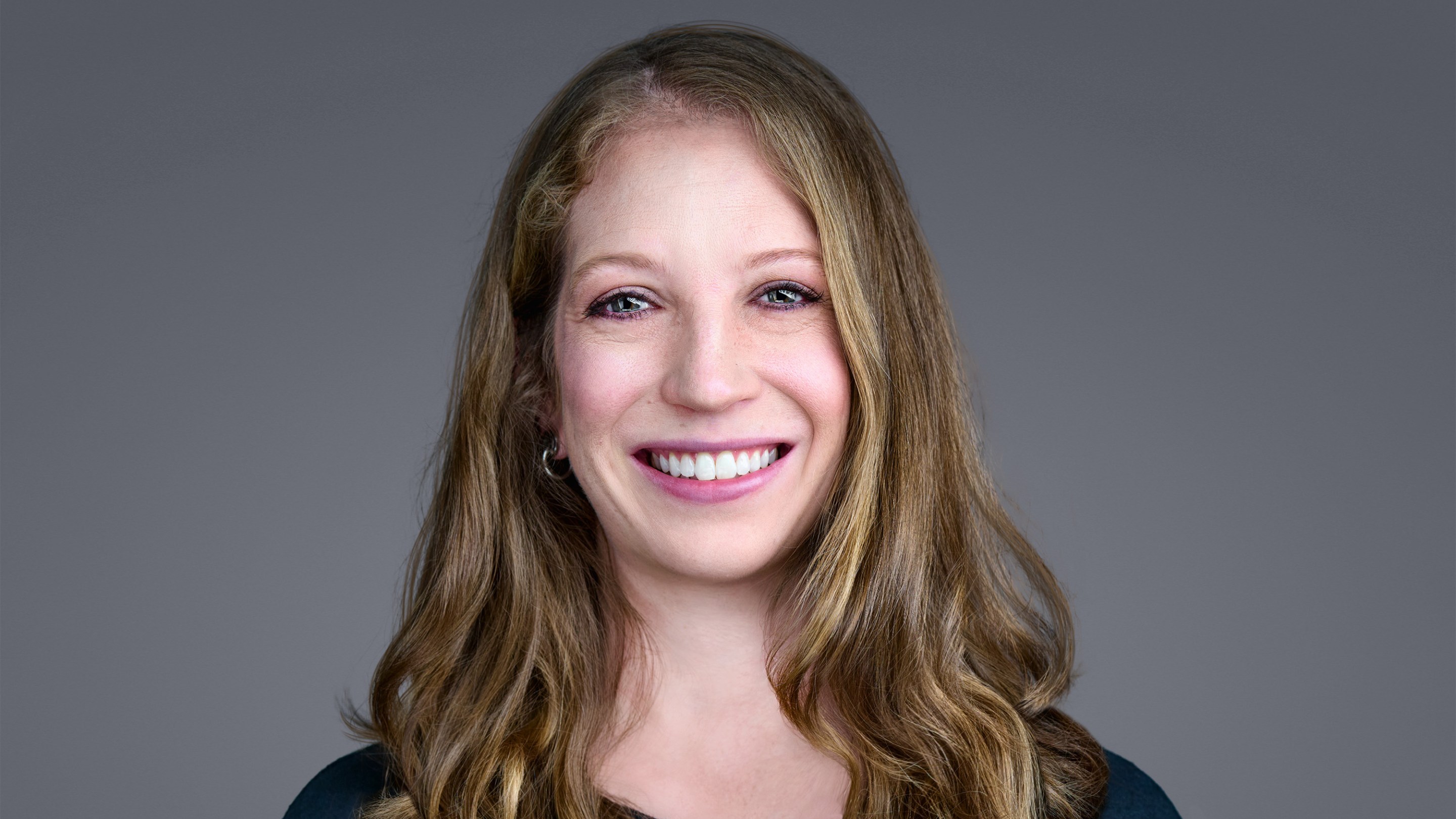 a headshot of fired CDC health communications manager Sarah Boim