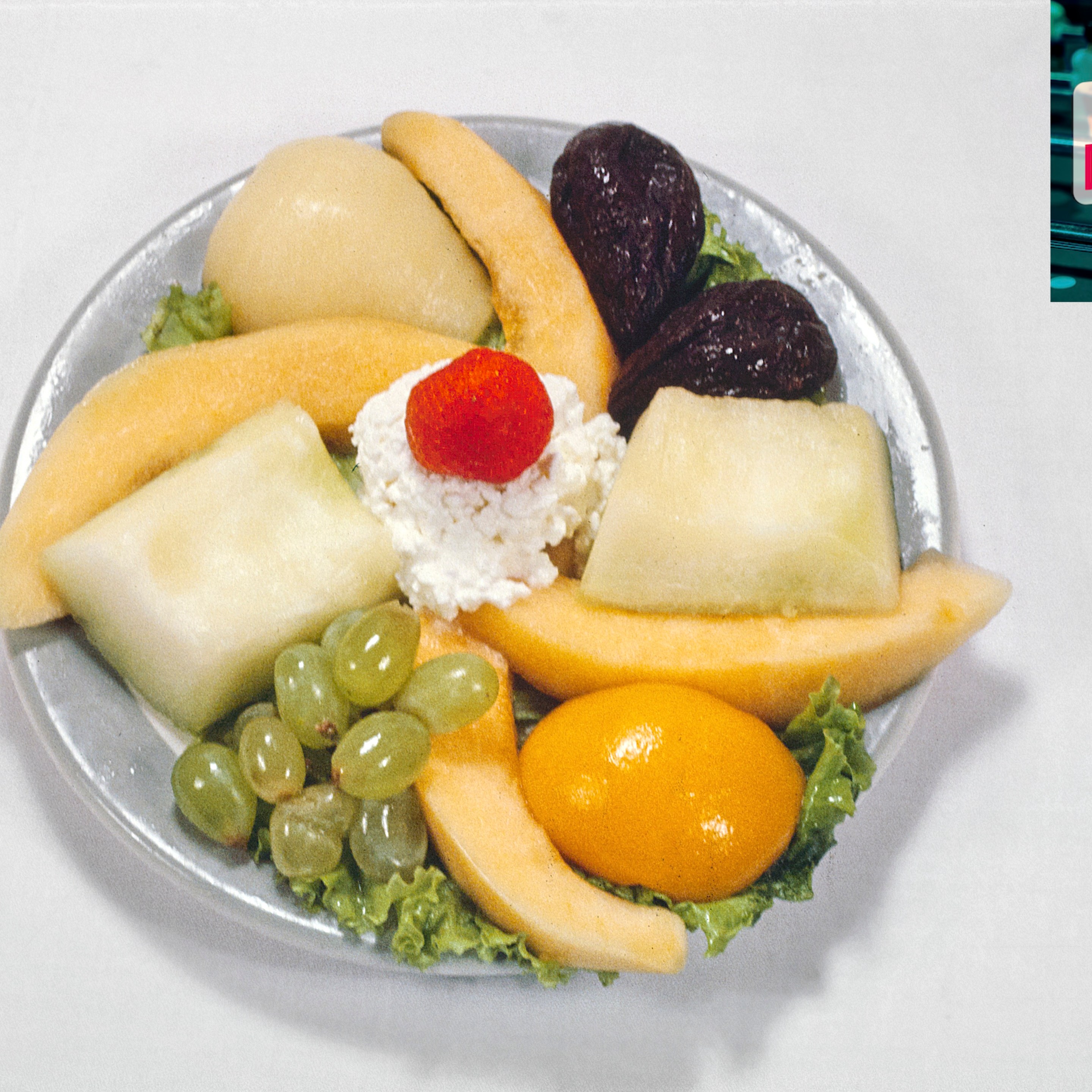 Fruit Plate, Menges Lakeside Hotel and Resort, Livingston Manor, New York, USA, John Margolies Roadside America Photograph Archive, 1978. It looks real messed up. Cottage cheese in the middle and such.