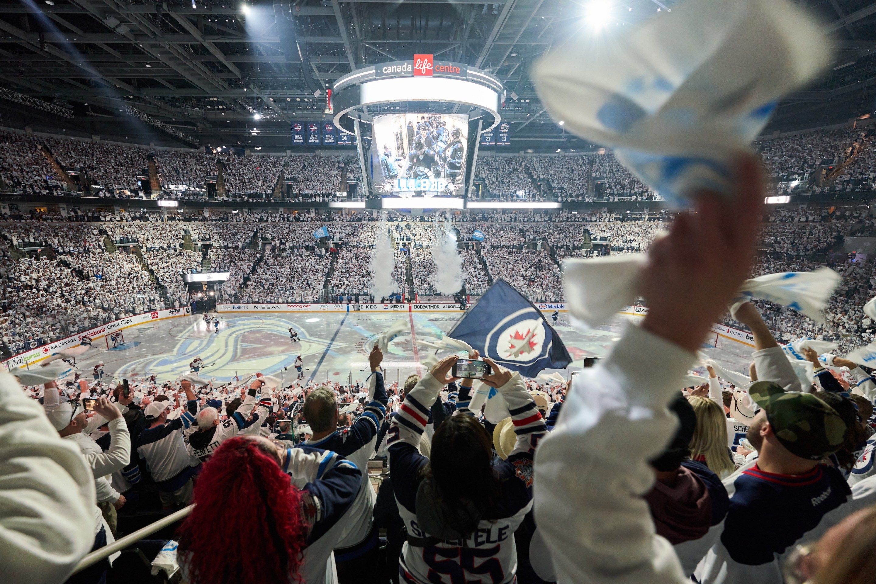 WINNIPEG, CANADA - APRIL 23: Winnipeg Jets fans cheer on their team as they get set to face off against the Colorado Avalanche in Game Two of the First Round of the 2024 Stanley Cup Playoffs at Canada Life Centre on April 23, 2024, in Winnipeg, Canada. (Photo by David Lipnowski/Getty Images)