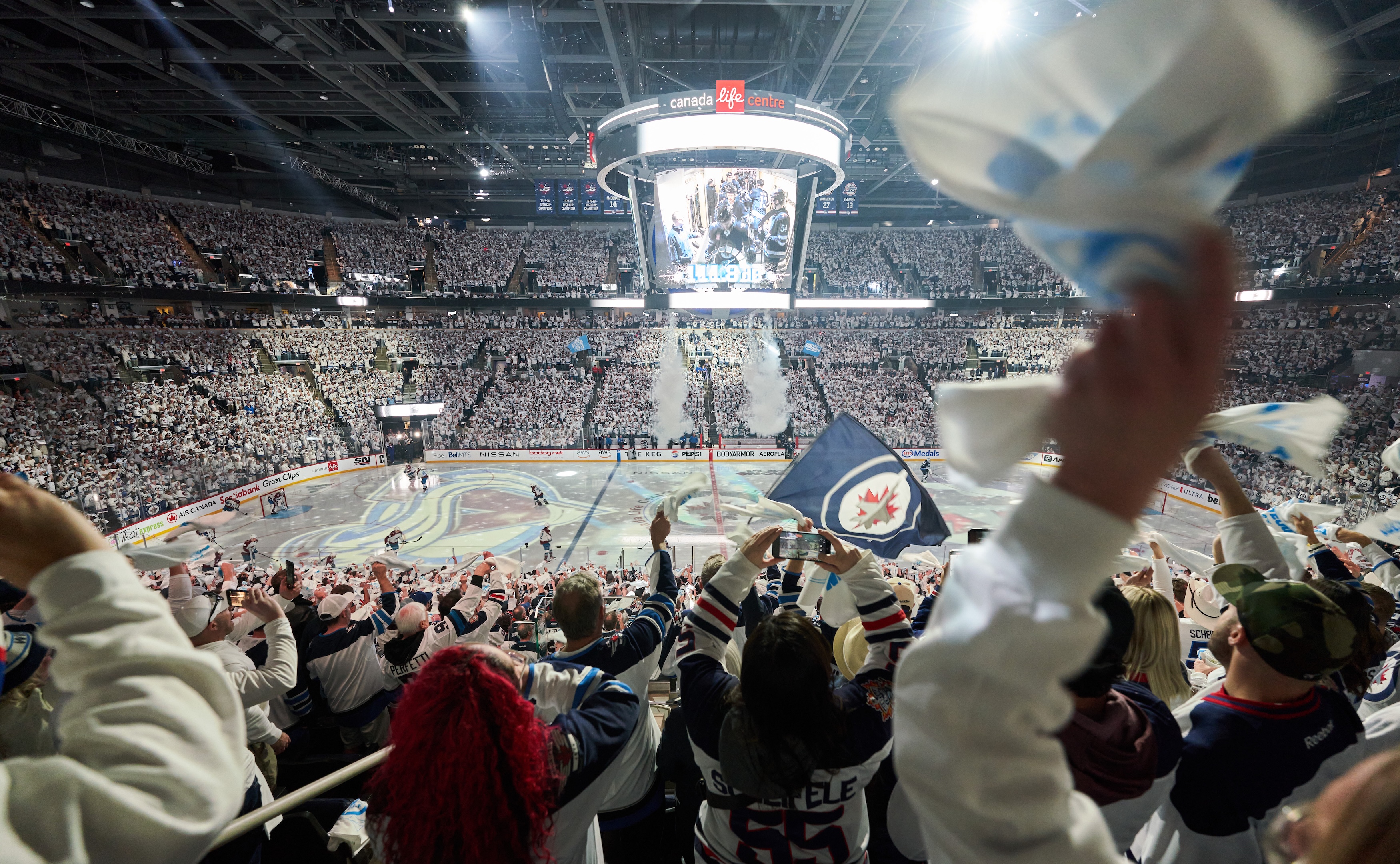 WINNIPEG, CANADA - APRIL 23: Winnipeg Jets fans cheer on their team as they get set to face off against the Colorado Avalanche in Game Two of the First Round of the 2024 Stanley Cup Playoffs at Canada Life Centre on April 23, 2024, in Winnipeg, Canada. (Photo by David Lipnowski/Getty Images)