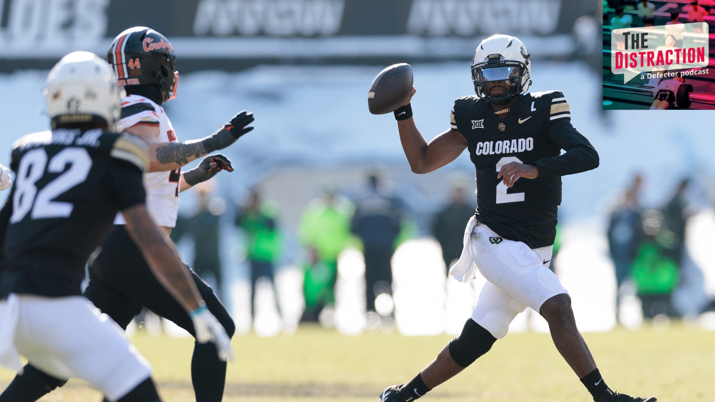 Shedeur Sanders of the Colorado Buffaloes runs with the ball during the first half against the Oklahoma State Cowboys at Folsom Field on November 29, 2024 in Boulder, Colorado.