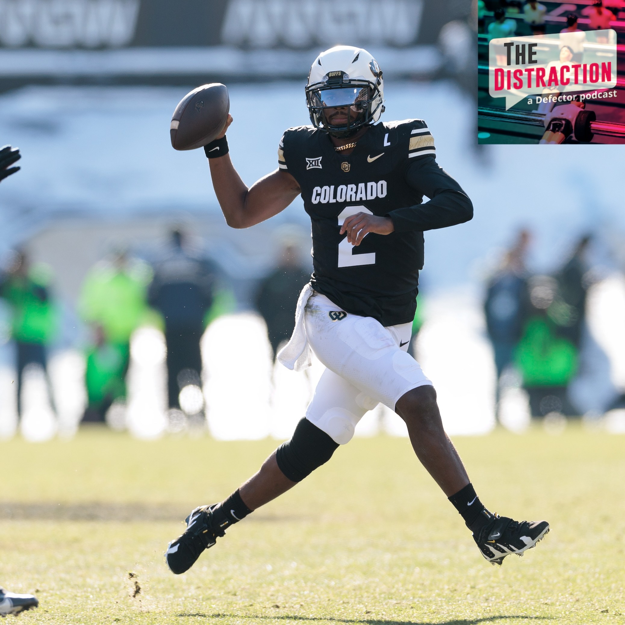 Shedeur Sanders of the Colorado Buffaloes runs with the ball during the first half against the Oklahoma State Cowboys at Folsom Field on November 29, 2024 in Boulder, Colorado.
