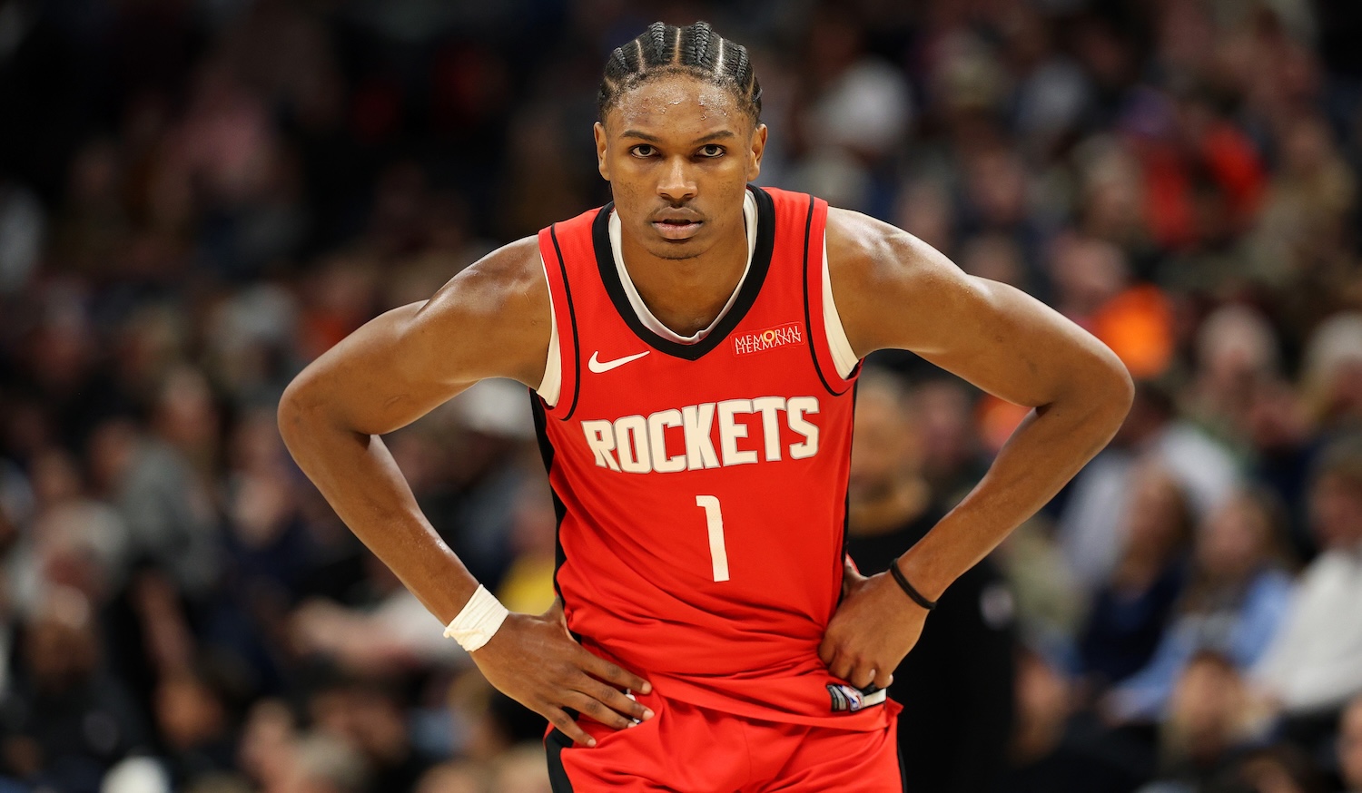 MINNEAPOLIS, MINNESOTA - FEBRUARY 06: Amen Thompson #1 of the Houston Rockets looks on against the Minnesota Timberwolves in the fourth quarter at Target Center on February 06, 2025 in Minneapolis, Minnesota. The Timberwolves defeated the Rockets 127-114. NOTE TO USER: User expressly acknowledges and agrees that, by downloading and or using this photograph, User is consenting to the terms and conditions of the Getty Images License Agreement. (Photo by David Berding/Getty Images)
