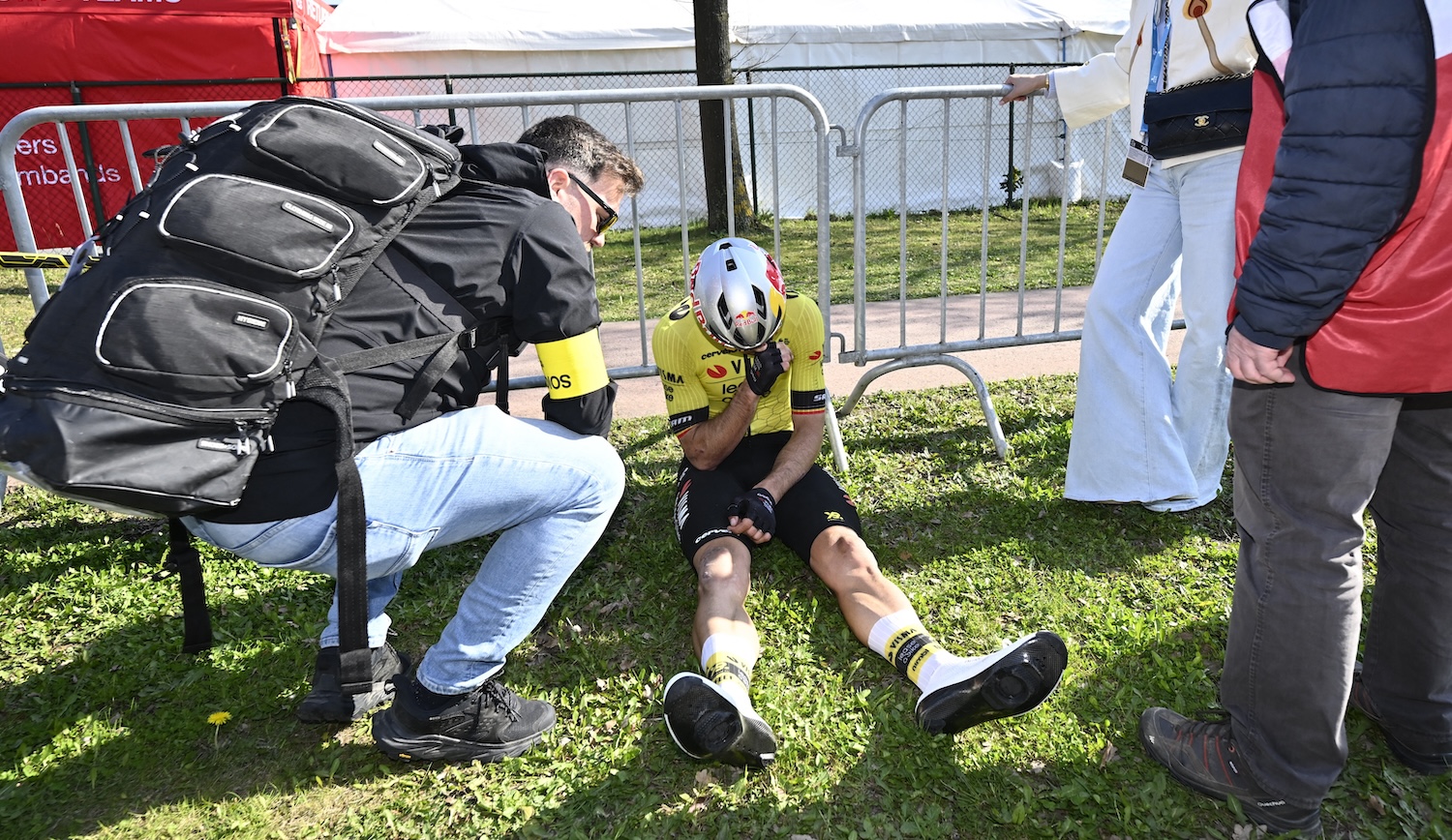 Team Visma-Lease a Bike's Belgian rider Wout van Aert (C) reacts at the end of the men's elite race 'Dwars Door Vlaanderen', 184,2 km from Roeselare to Waregem, on April 2, 2025. (Photo by DIRK WAEM / Belga / AFP) / Belgium OUT