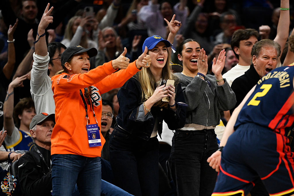 Fans celebrate a three-point basket by Brandin Podziemski #2 of the Golden State Warriors against the Denver Nuggets in the fourth quarter at Chase Center on April 04, 2025 in San Francisco, California. NOTE TO USER: User expressly acknowledges and agrees that, by downloading and or using this photograph, User is consenting to the terms and conditions of the Getty Images License Agreement.