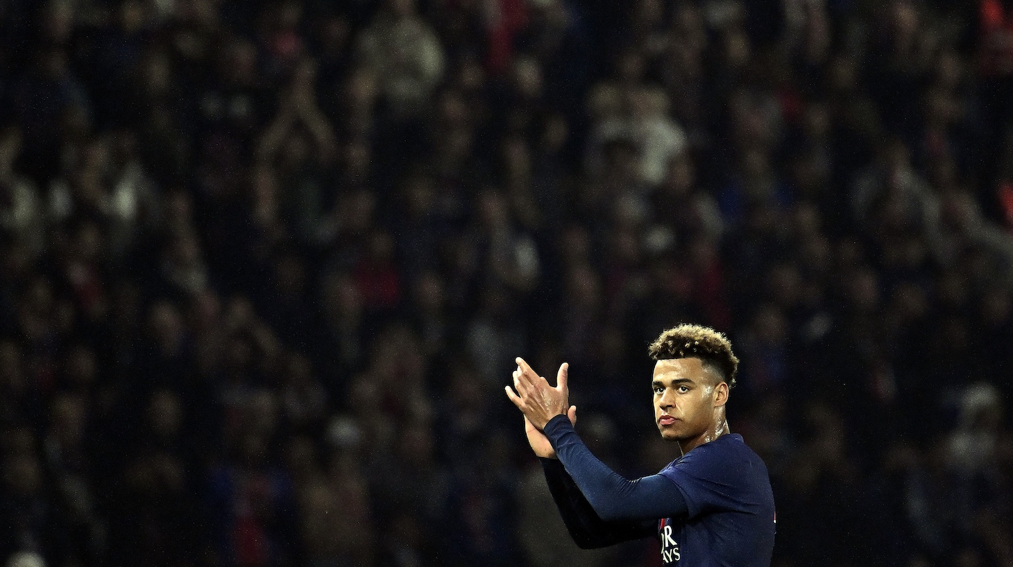 Desire Doue of Paris Saint-Germain salutes the fans as he exits the match during the UEFA Champions League 2024/25 Quarter Final First Leg match between Paris Saint-Germain and Aston Villa FC at Parc des Princes on April 09, 2025 in Paris, France.