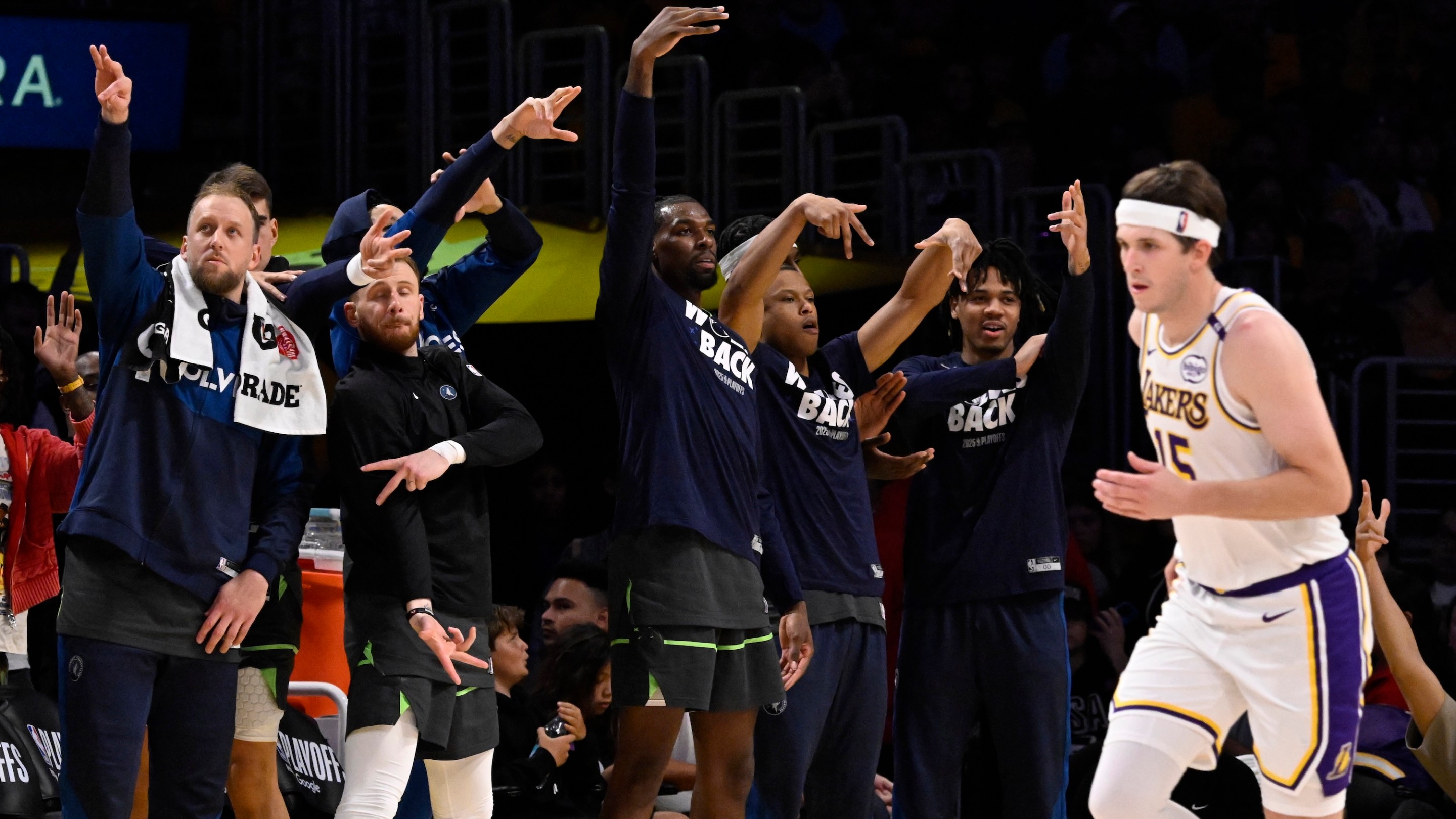 Los Angeles, CA - April 19: Minnesota Timberwolves bench reacts after a basket as Austin Reaves #15 of the Los Angeles Lakers looks on in the second half of a first round game one NBA basketball game at Crypto.com Arena in Los Angeles on Saturday, April 19, 2025. (Photo by Keith Birmingham/MediaNews Group/Pasadena Star-News via Getty Images)