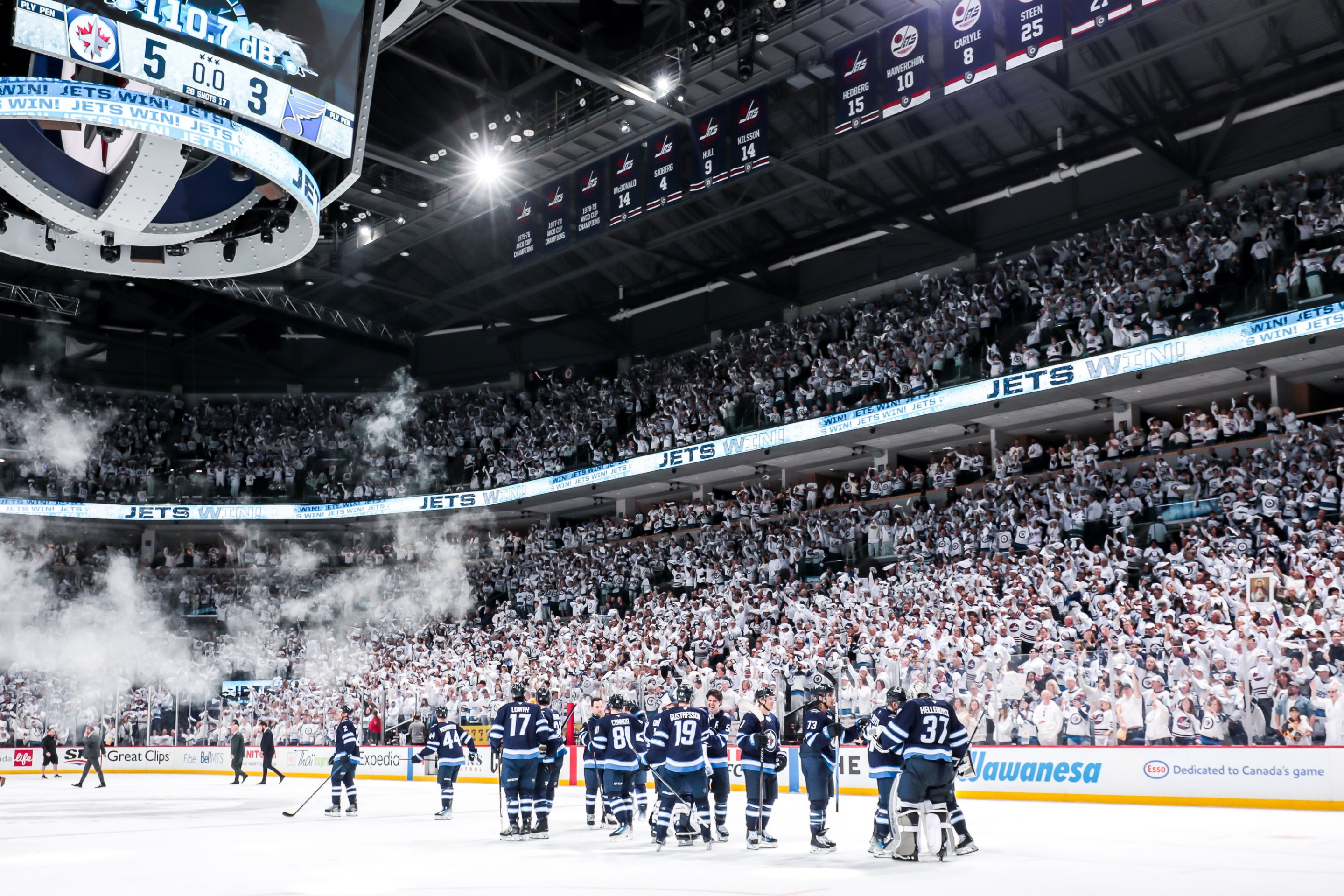 WINNIPEG, CANADA - APRIL 19: Winnipeg Jets players celebrate on the ice following a 5-3 victory over the St. Louis Blues in Game One of Game One of the First Round of the 2025 Stanley Cup Playoffs at the Canada Life Centre on April 19, 2025 in Winnipeg, Manitoba, Canada. (Photo by Darcy Finley/NHLI via Getty Images)