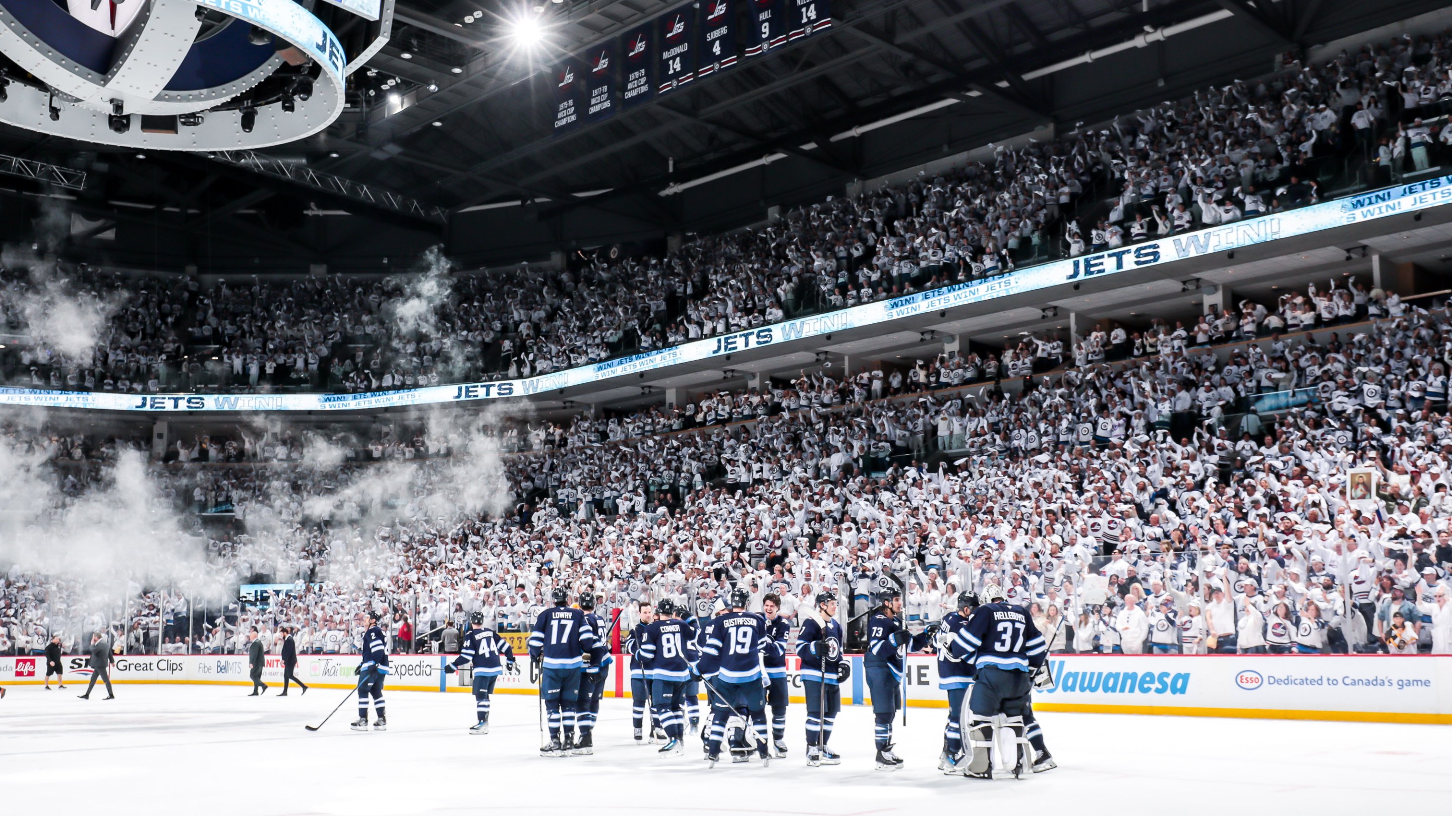 WINNIPEG, CANADA - APRIL 19: Winnipeg Jets players celebrate on the ice following a 5-3 victory over the St. Louis Blues in Game One of Game One of the First Round of the 2025 Stanley Cup Playoffs at the Canada Life Centre on April 19, 2025 in Winnipeg, Manitoba, Canada. (Photo by Darcy Finley/NHLI via Getty Images)