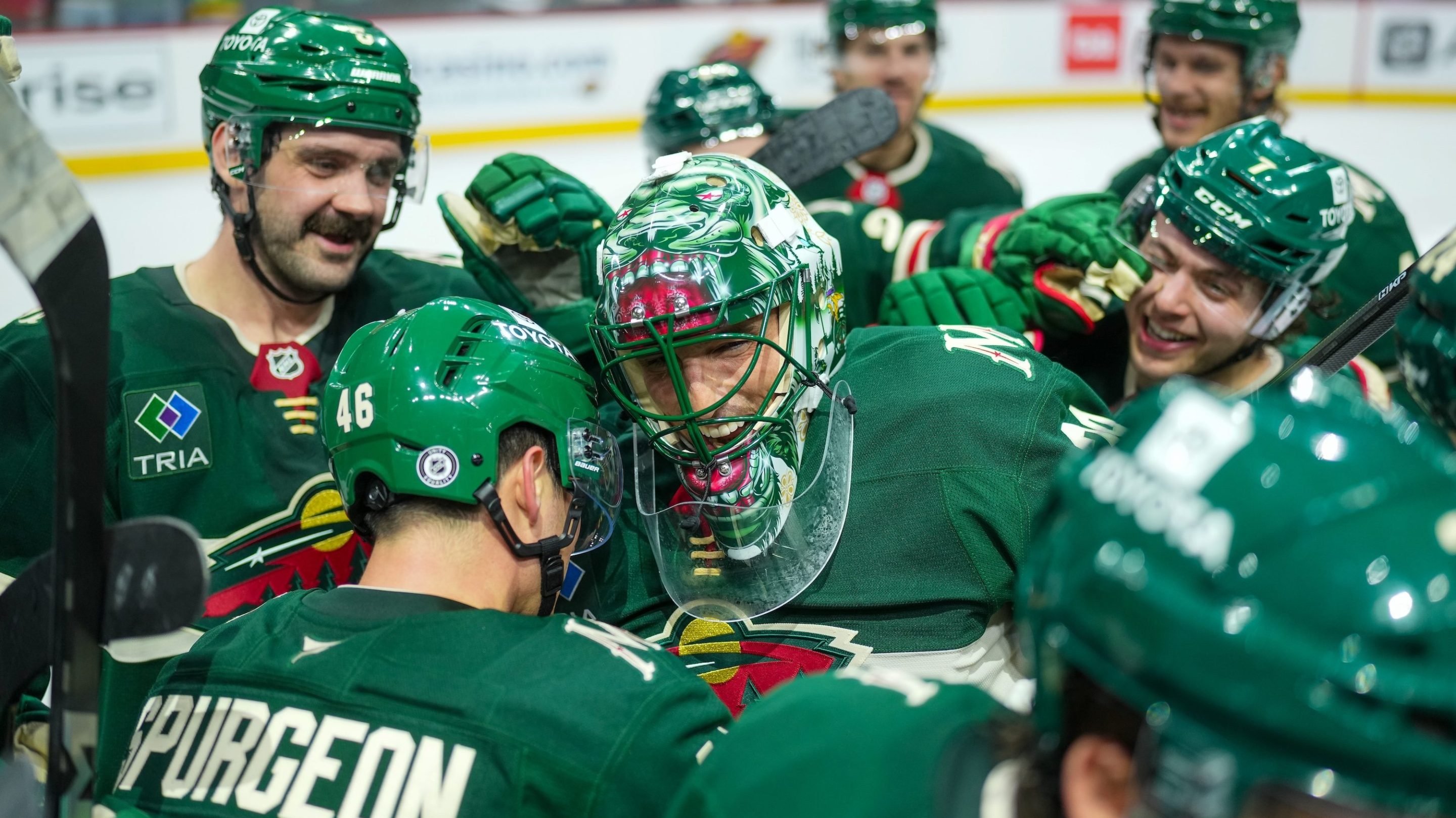 ST PAUL, MINNESOTA - APRIL 15:-Andre Fleury #29 of the Minnesota Wild gets surrounded by teammates after an overtime win against the Anaheim Ducks at Xcel Energy Center on April 15, 2025 in St Paul, Minnesota. (Photo by Luke Schmidt/NHLI via Getty Images)