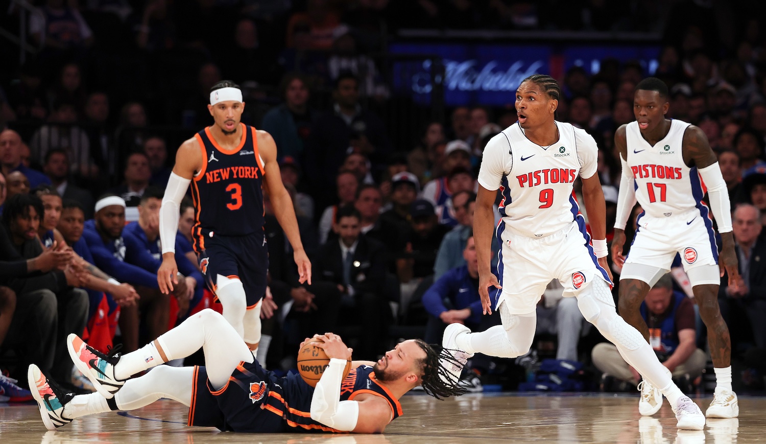 NEW YORK, NEW YORK - APRIL 21: Jalen Brunson #11 of the New York Knicks and Ausar Thompson #9 of the Detroit Pistons react after a call during the fourth quarter in Game Two of the Eastern Conference First Round NBA Playoffs at Madison Square Garden on April 21, 2025 in New York City. NOTE TO USER: User expressly acknowledges and agrees that, by downloading and or using this photograph, User is consenting to the terms and conditions of the Getty Images License Agreement. (Photo by Al Bello/Getty Images)