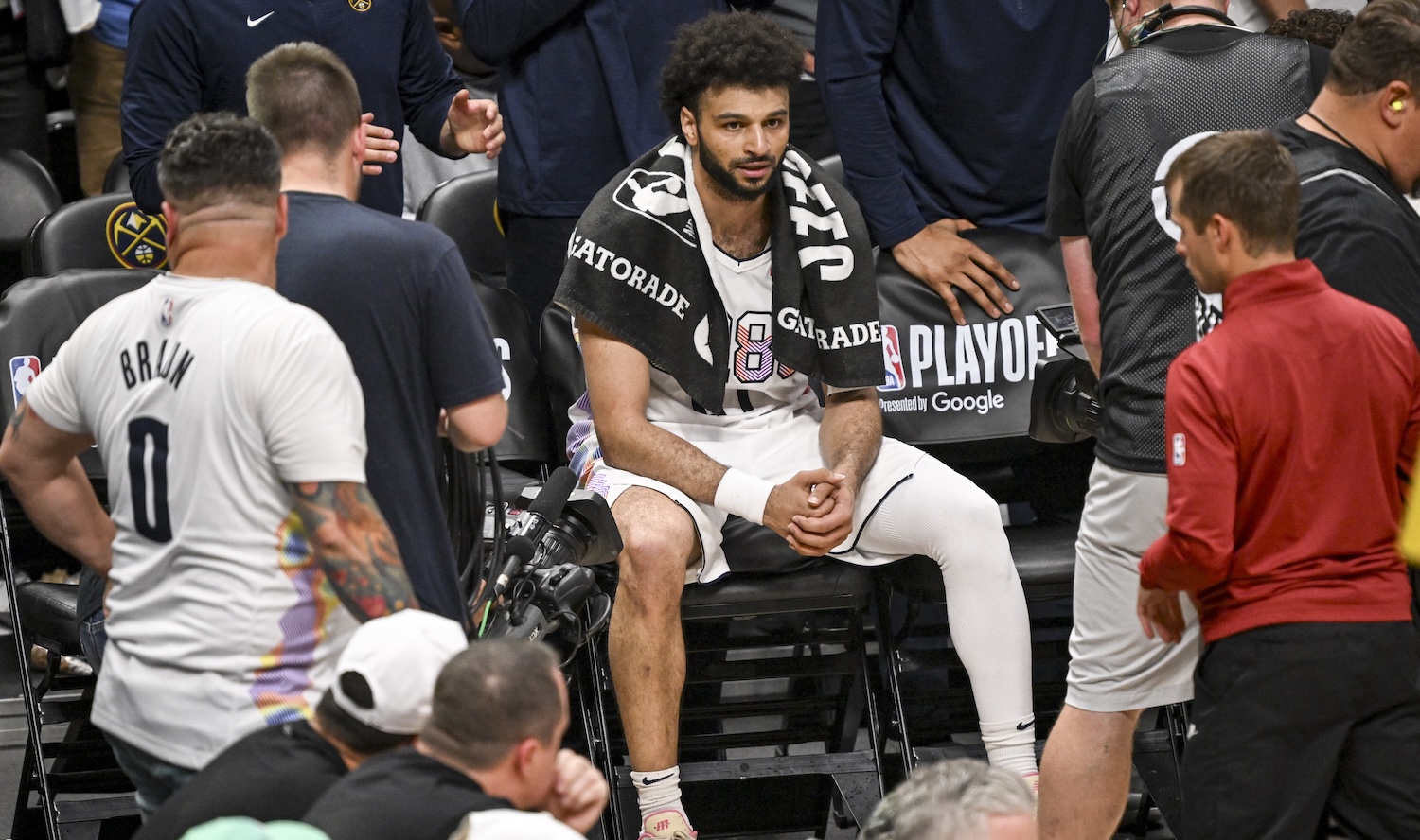 Jamal Murray (27) of the Denver Nuggets sits on the bench after notching his 40th point during the fourth quarter of the Nuggets' 131-115 win over the LA Clippers