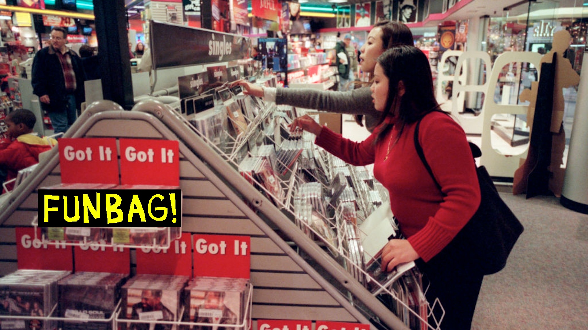 My Yang right, and Pang Nhia of Minneapolis look for CD's at the Sam Goody store in City Center in downtown Minneapolis on Thursday.