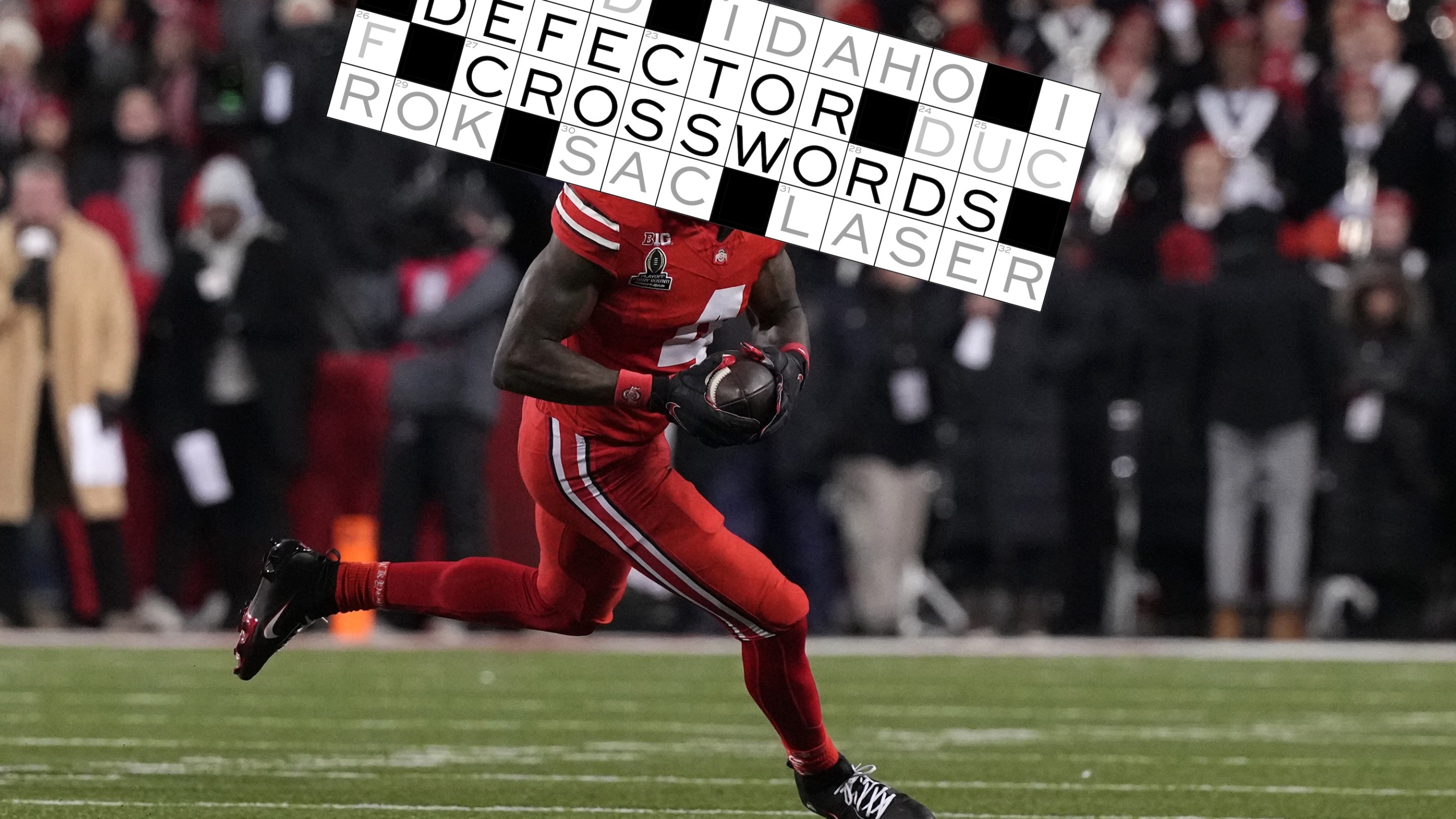 Wide receiver Jeremiah Smith #4 of the Ohio State Buckeyes seen in action during the game against the Tennessee Volunteers at Ohio Stadium on December 21, 2024 in Columbus, Ohio