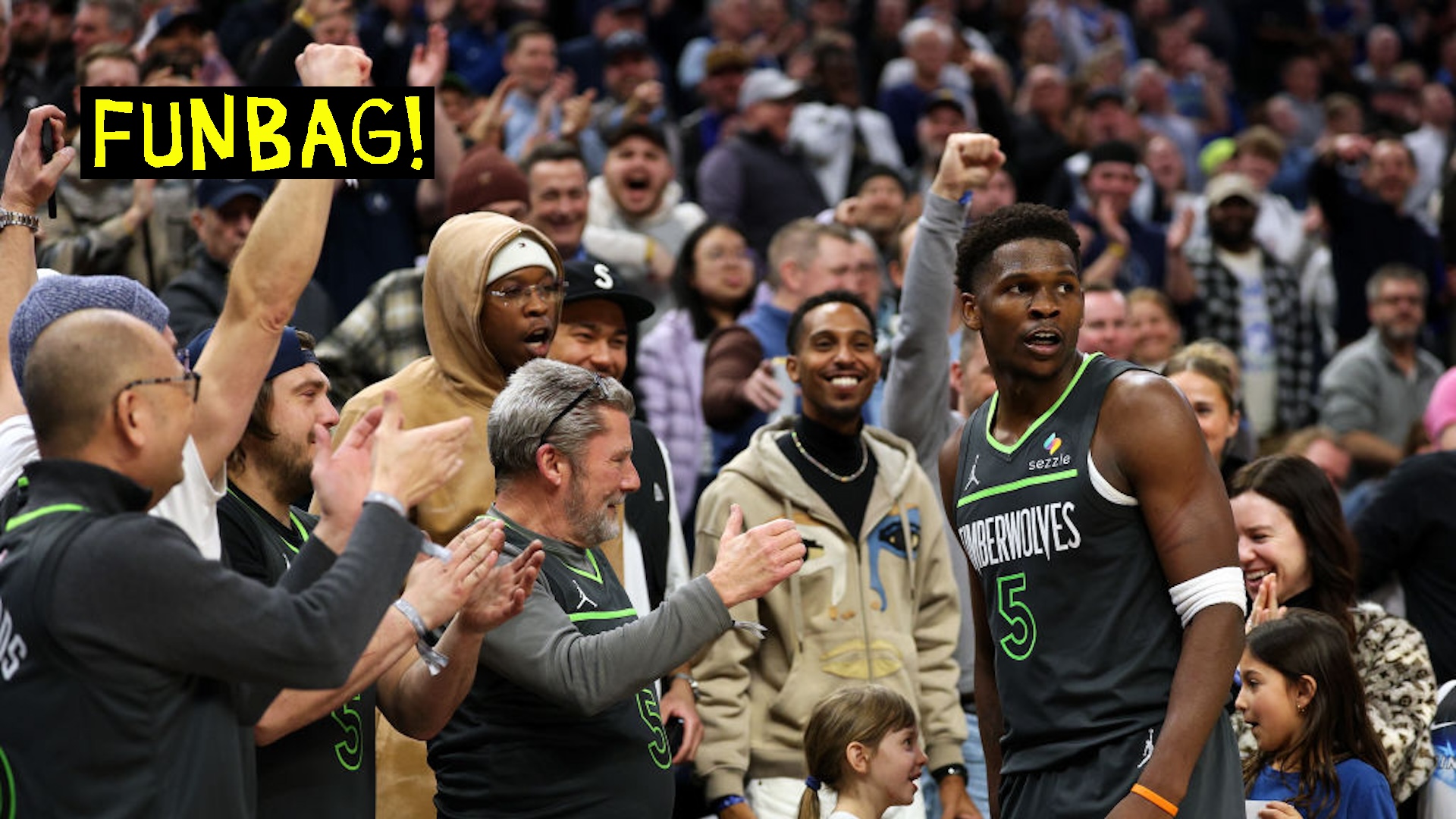 Anthony Edwards #5 of the Minnesota Timberwolves celebrates with fans in the fourth quarter against the Houston Rockets at Target Center on February 06, 2025 in Minneapolis, Minnesota. The Timberwolves defeated the Rockets 127-114. NOTE TO USER: User expressly acknowledges and agrees that, by downloading and or using this photograph, User is consenting to the terms and conditions of the Getty Images License Agreement.
