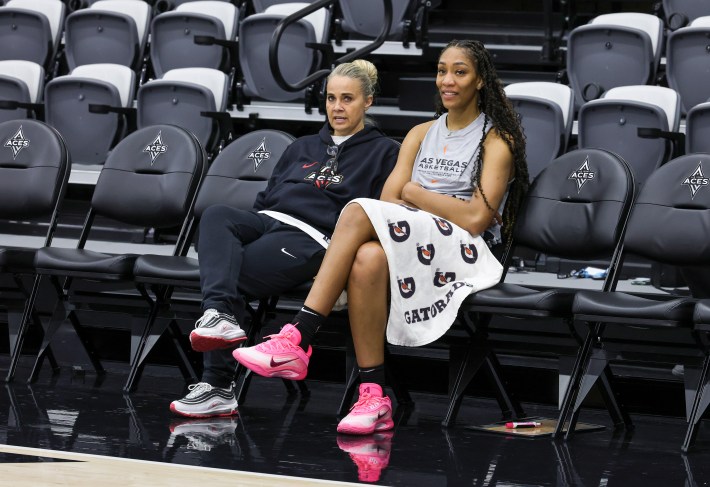 Head coach Becky Hammon (L) and A'ja Wilson #22 of the Las Vegas Aces talk after the team's first day of training camp at Las Vegas Aces Headquarters on April 27, 2025 in Henderson, Nevada.