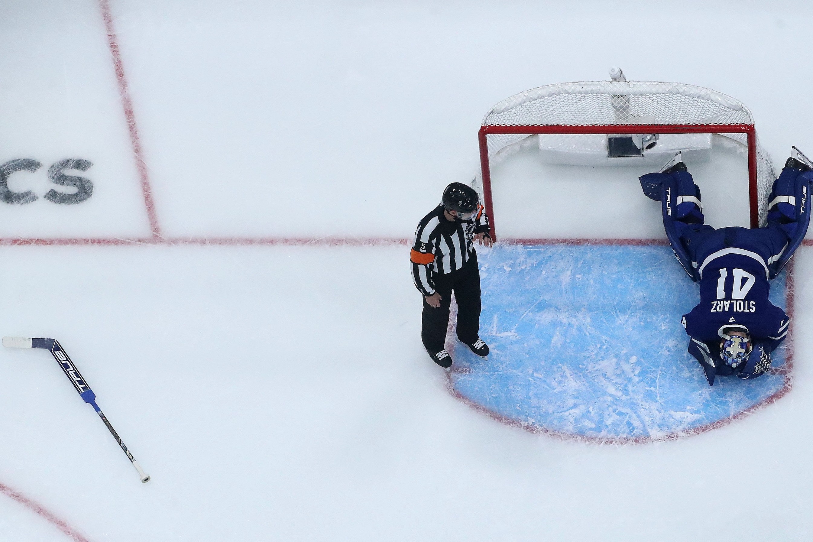 TORONTO, ON - MAY 5 - Referee Chris Rooney (5) blows the play dead as Toronto Maple Leafs goaltender Anthony Stolarz (41) lays on the ice as the Toronto Maple Leafs beat the Florida Panthers 5-4 in the first game of their second round series of the NHL Stanley Cup Play-offs at Scotiabank Arena in Toronto. May 5, 2025. Steve Russell/Toronto Star