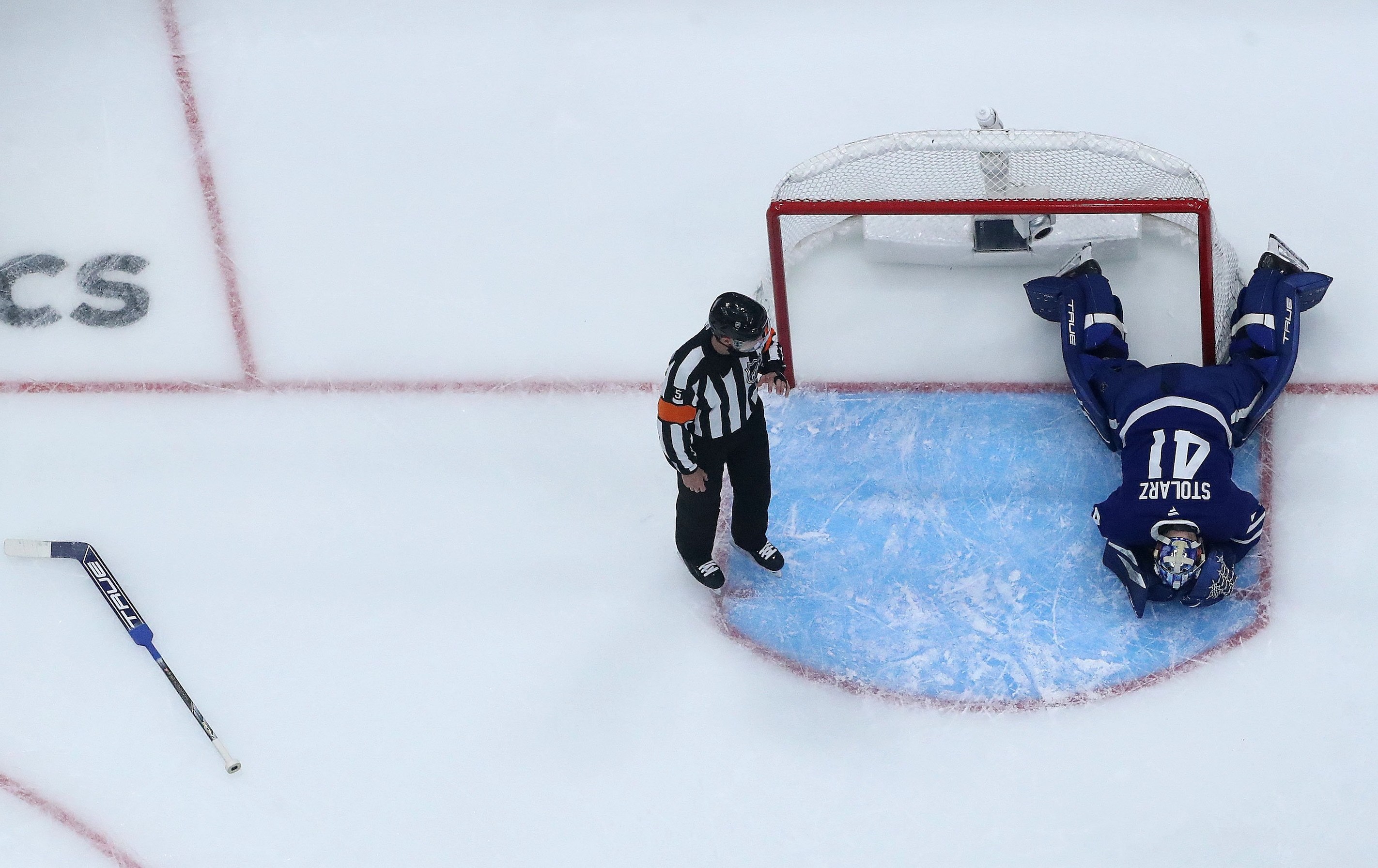 TORONTO, ON - MAY 5 - Referee Chris Rooney (5) blows the play dead as Toronto Maple Leafs goaltender Anthony Stolarz (41) lays on the ice as the Toronto Maple Leafs beat the Florida Panthers 5-4 in the first game of their second round series of the NHL Stanley Cup Play-offs at Scotiabank Arena in Toronto. May 5, 2025. Steve Russell/Toronto Star