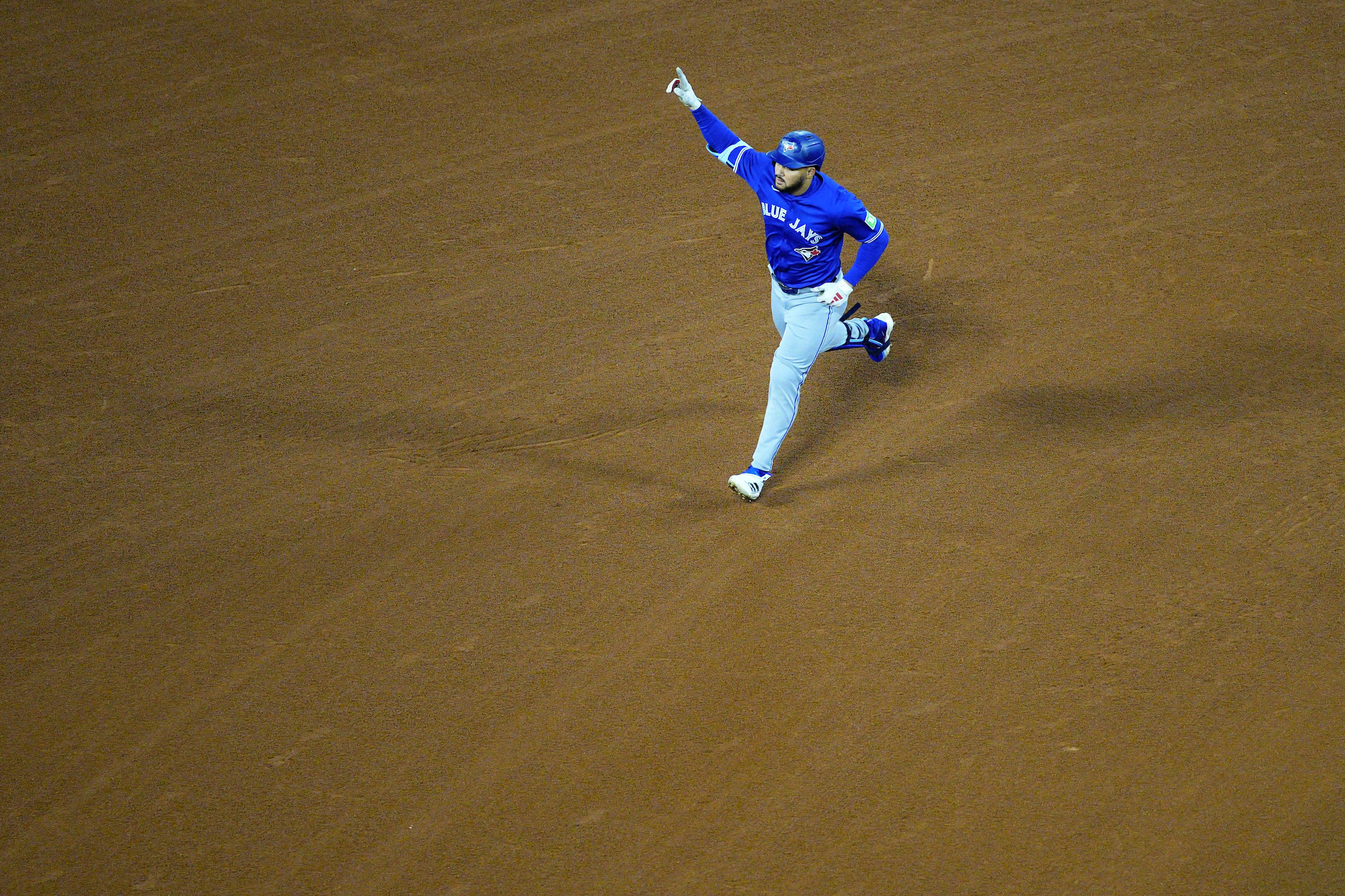 Anthony Santander of the Toronto Blue Jays rounds the bases after hitting a solo home run in the eighth inning during the game between the Toronto Blue Jays and the Los Angeles Angels.