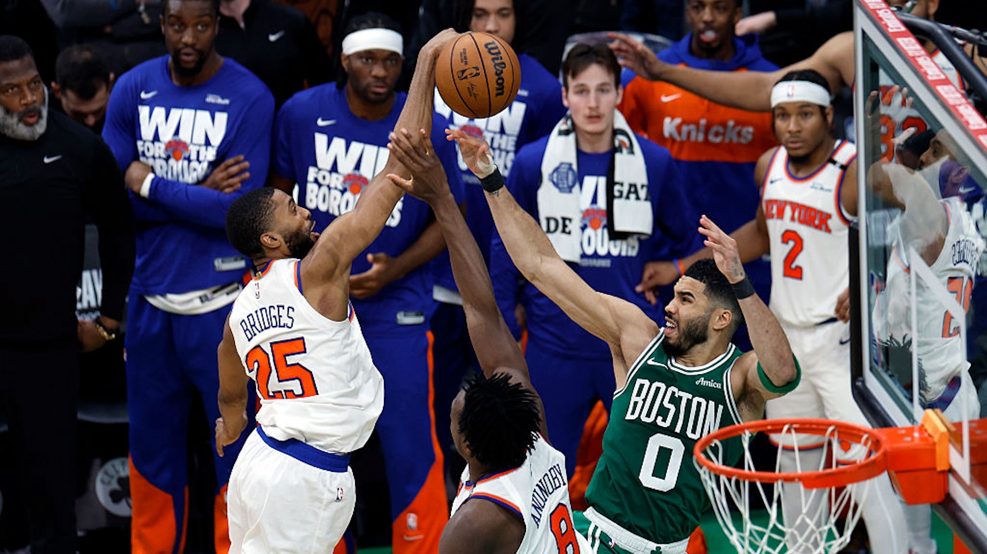 New York Knicks forward Mikal Bridges blocks a shot by Boston Celtics forward Jayson Tatum at the end of Game 2 of the Eastern Conference Semifinals at TD Garden.