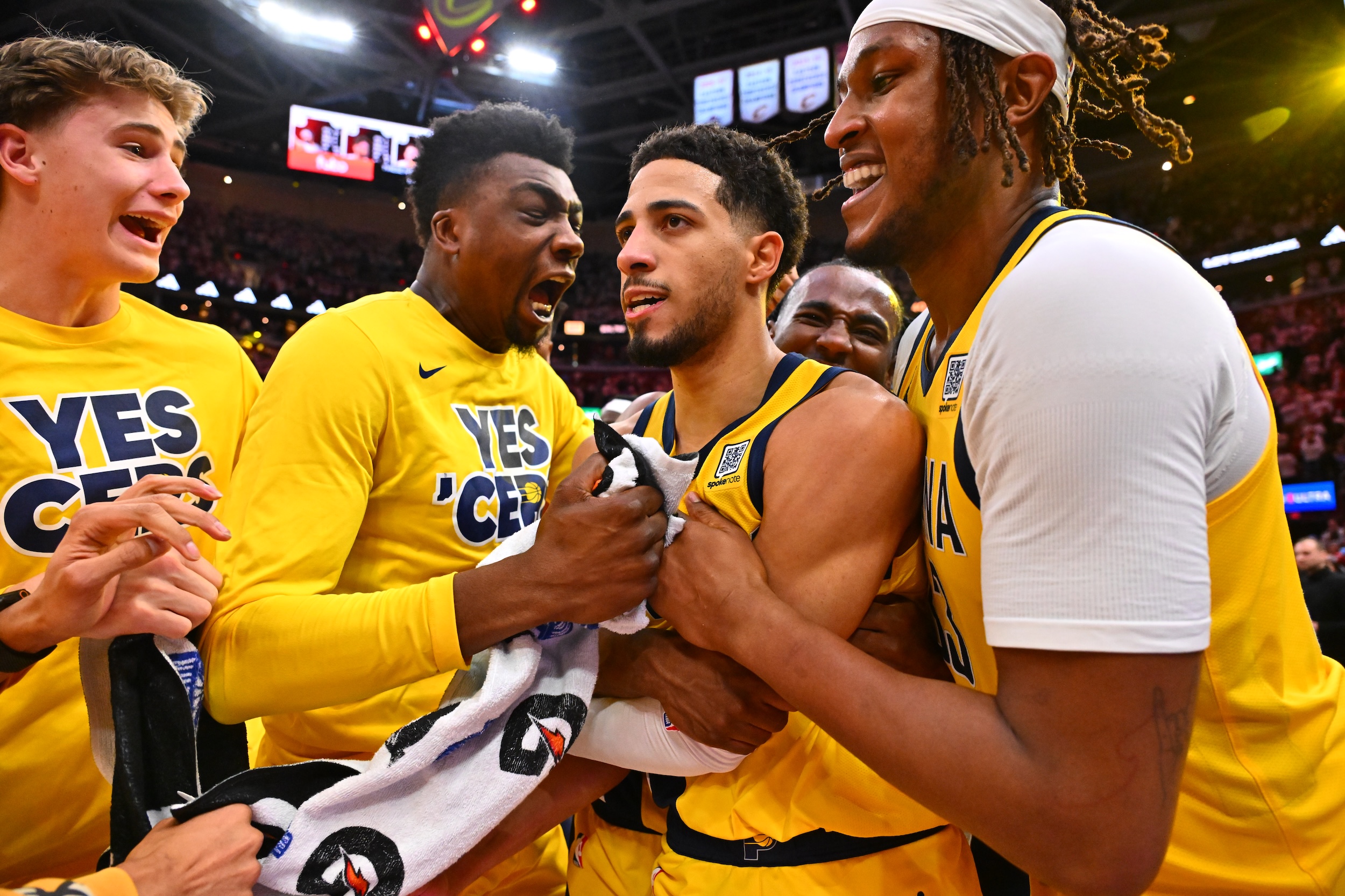 Tyrese Haliburton celebrates with teammates after defeating the Cleveland Cavaliers