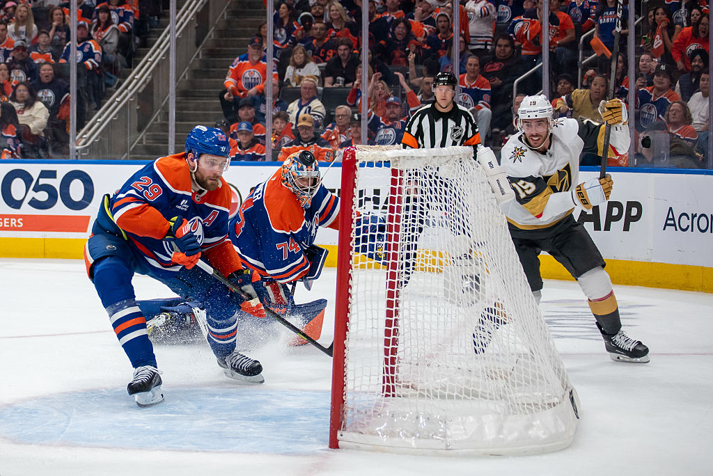 Reilly Smith #19 of the Vegas Golden Knights scores a late goal against Stuart Skinner #74