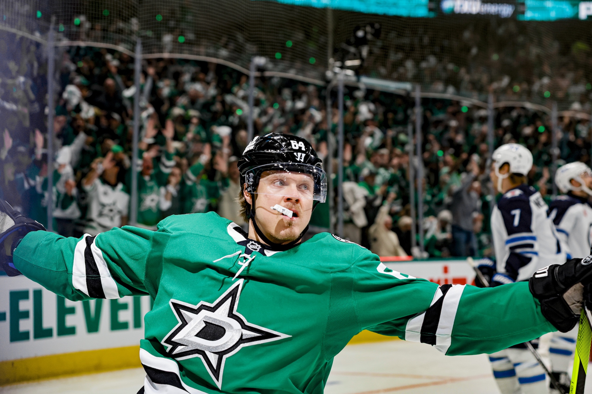 DALLAS, TX - MAY 13: Dallas Stars center Mikael Granlund (64) scores a goal for a hat trick during game 4 of round 2 of the Stanley Cup Playoffs between the Dallas Stars and the Winnipeg Jets on May 13, 2025 at American Airlines Center in Dallas, Texas. (Photo by Matthew Pearce/Icon Sportswire via Getty Images)