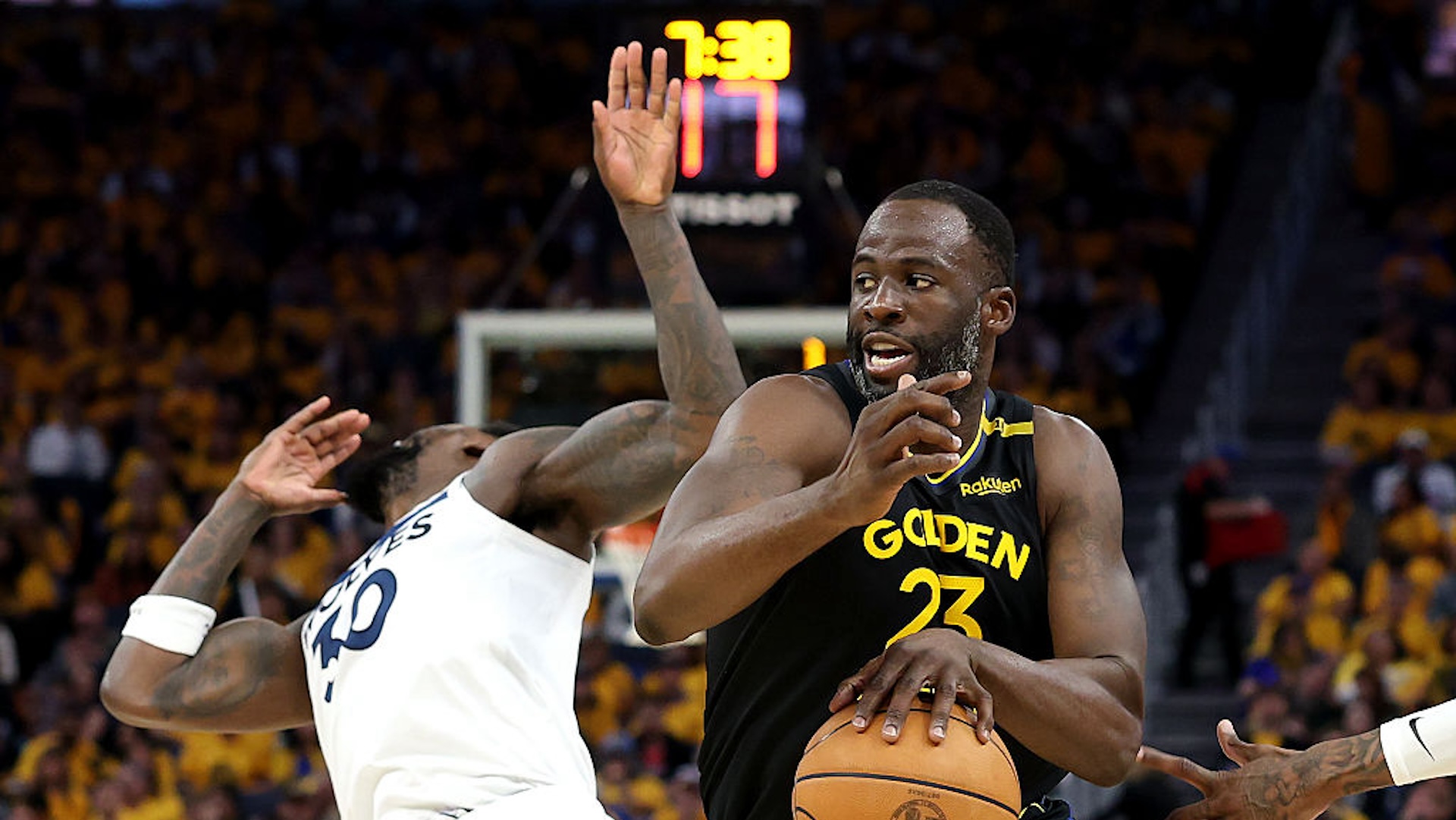 Draymond Green #23 of the Golden State Warriors dribbles the ball against Julius Randle #30 of the Minnesota Timberwolves during the third quarter in Game Four of the Western Conference Second Round NBA Playoffs at Chase Center on May 12, 2025 in San Francisco, California. NOTE TO USER: User expressly acknowledges and agrees that, by downloading and or using this photograph, User is consenting to the terms and conditions of the Getty Images License Agreement.