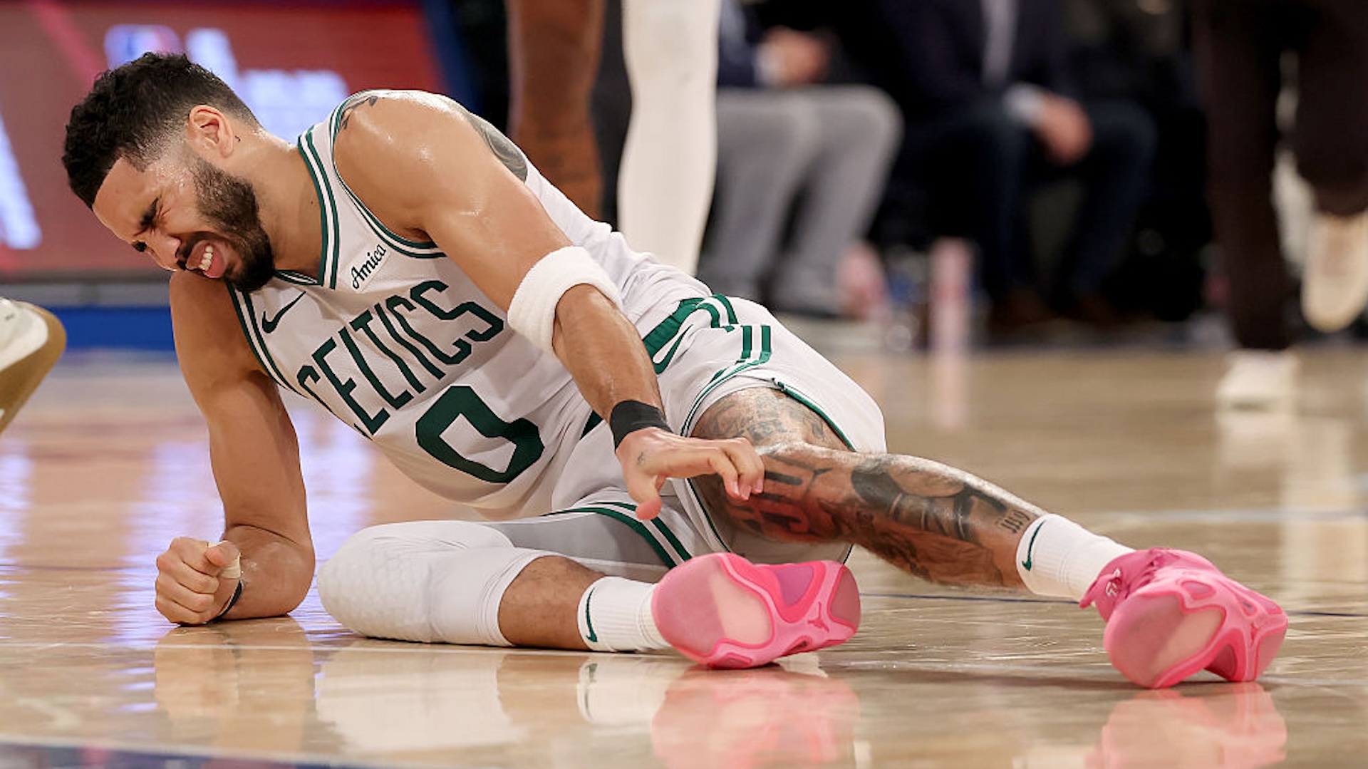 Jayson Tatum #0 of the Boston Celtics lays on the ground after being injured against the New York Knicks during the fourth quarter in Game Four of the Eastern Conference Second Round NBA Playoffs at Madison Square Garden on May 12, 2025 in New York City. NOTE TO USER: User expressly acknowledges and agrees that, by downloading and or using this photograph, User is consenting to the terms and conditions of the Getty Images License Agreement.