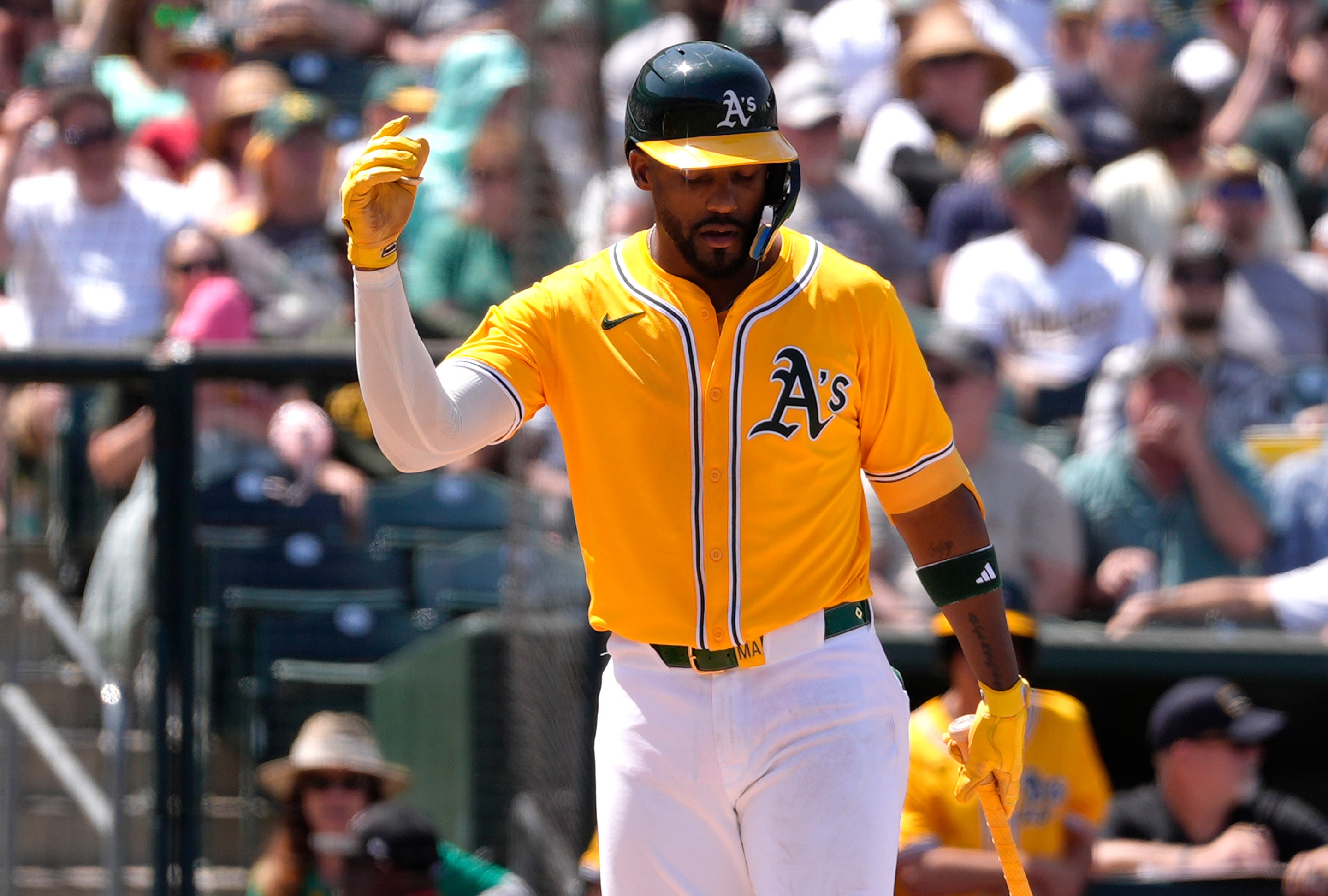 Miguel Andujar of the Athletics reacts at a called strike against the Philadelphia Phillies in the bottom of the seventh inning of a major league baseball game at Sutter Health Park on May 25, 2025 in Sacramento, California.