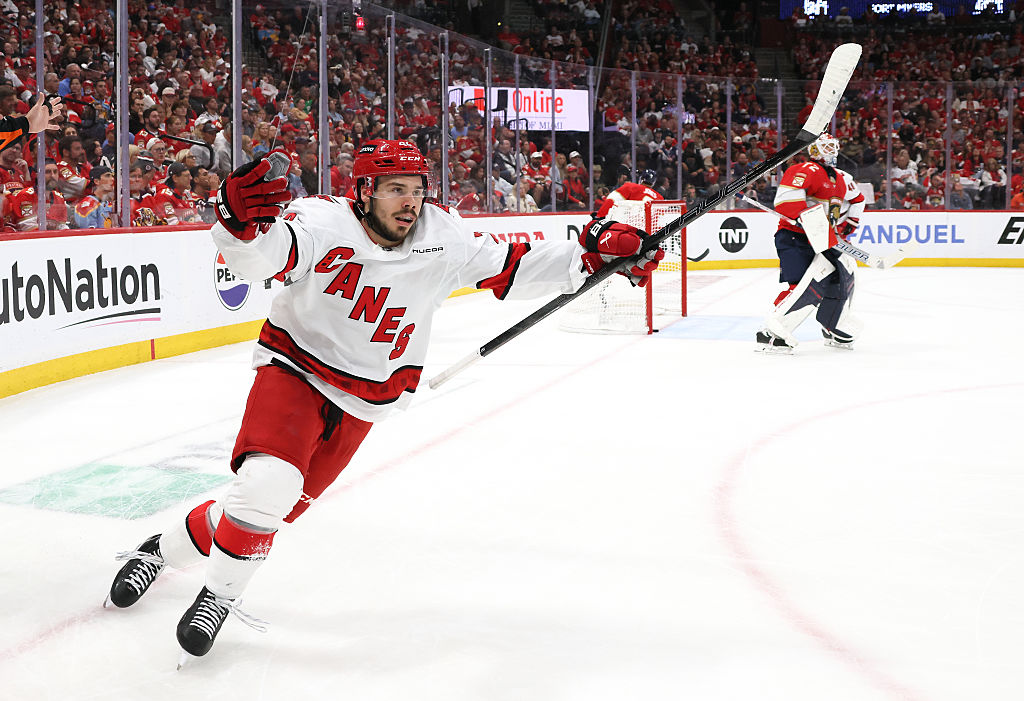 Logan Stankoven #22 of the Carolina Hurricanes celebrates after scoring a goal