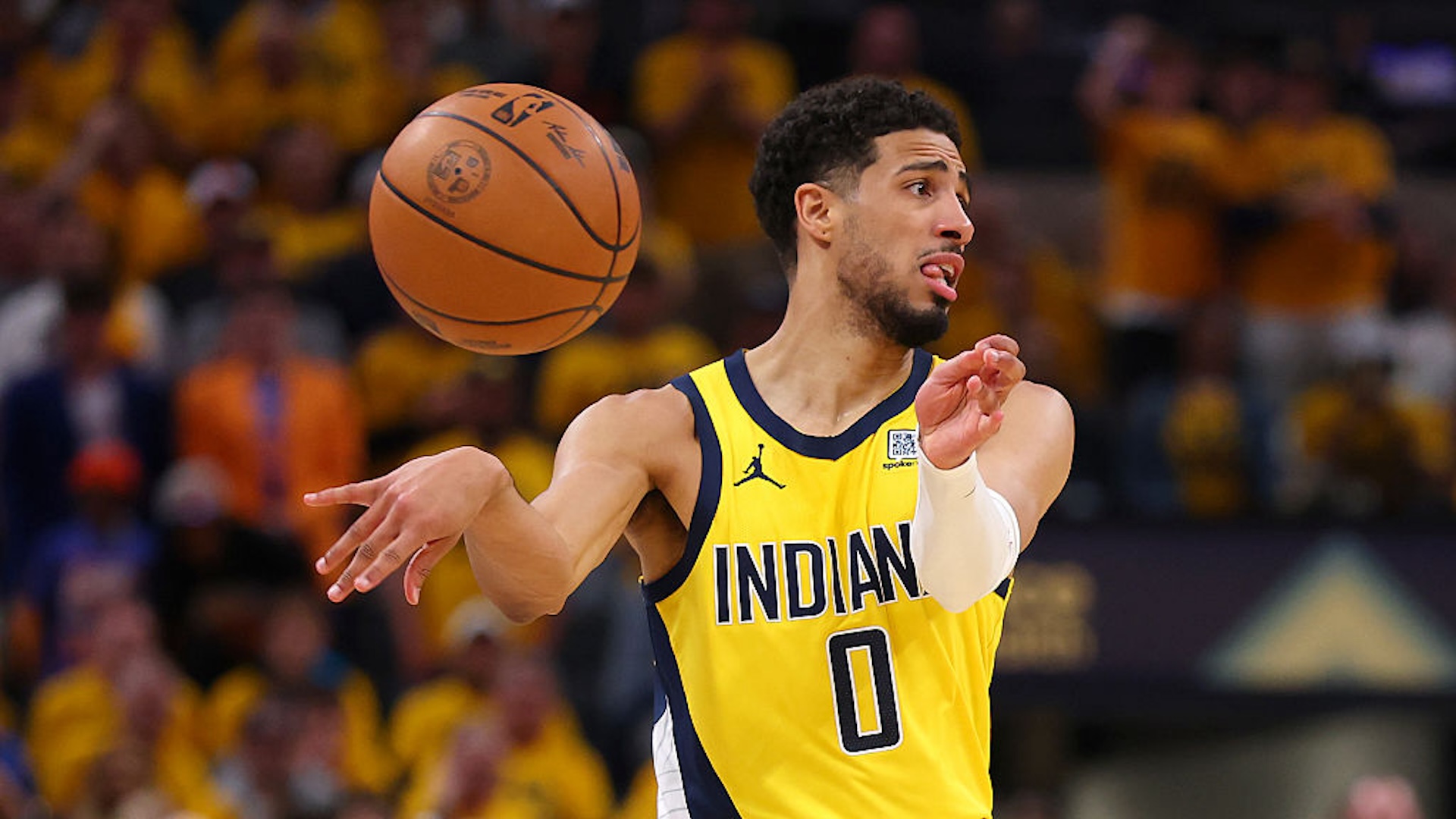 Tyrese Haliburton #0 of the Indiana Pacers attempts a pass against the New York Knicks during the first quarter in Game Four of the Eastern Conference Finals of the 2025 NBA Playoffs at Gainbridge Fieldhouse on May 27, 2025 in Indianapolis, Indiana.