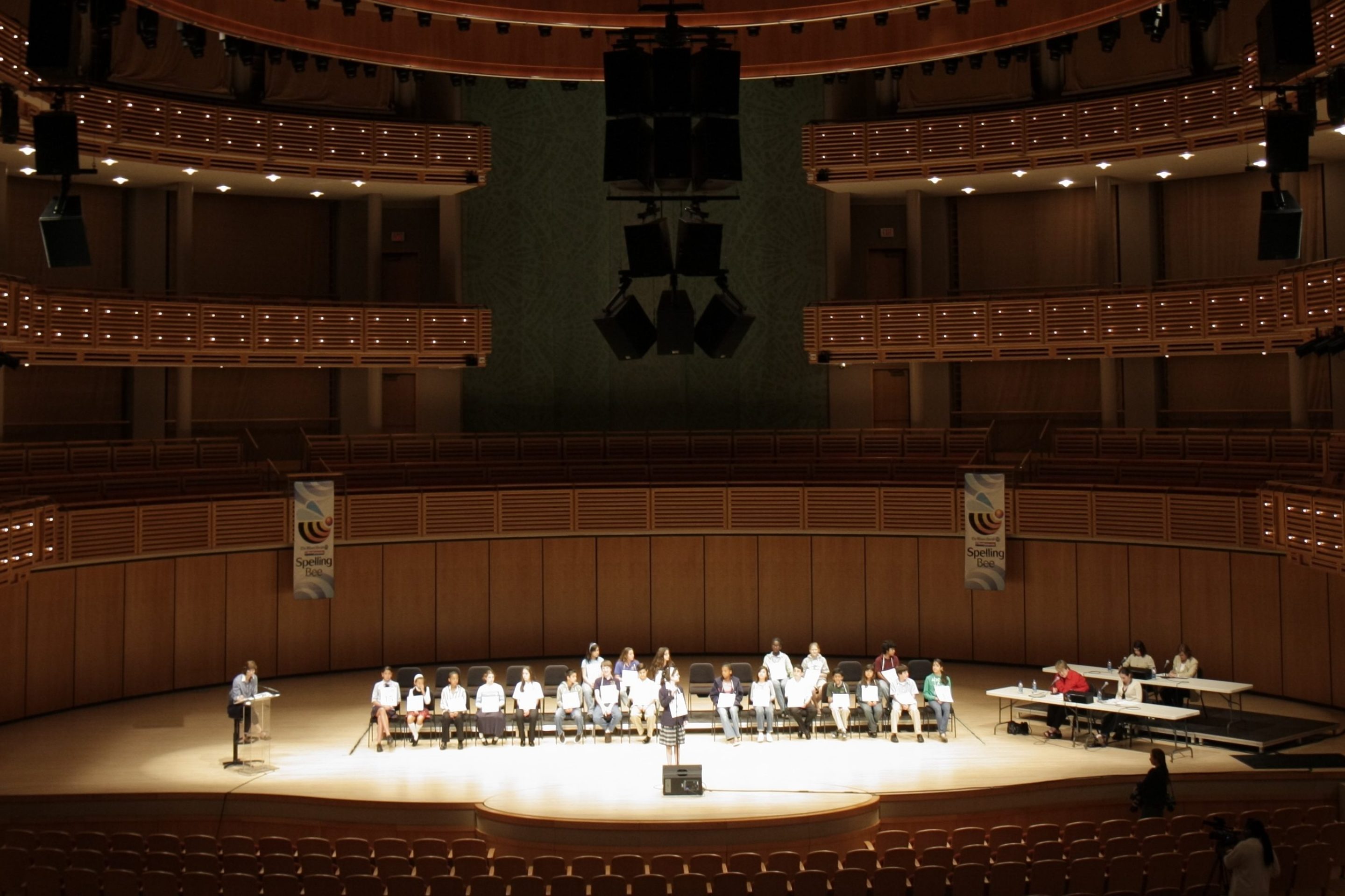 Florida, Miami, Arscht Performing Arts Center, The Miami Herald Spelling Bee, test, competition, stage, overview, contestants, judges, moderator, sit, chair, elimination, opera house,