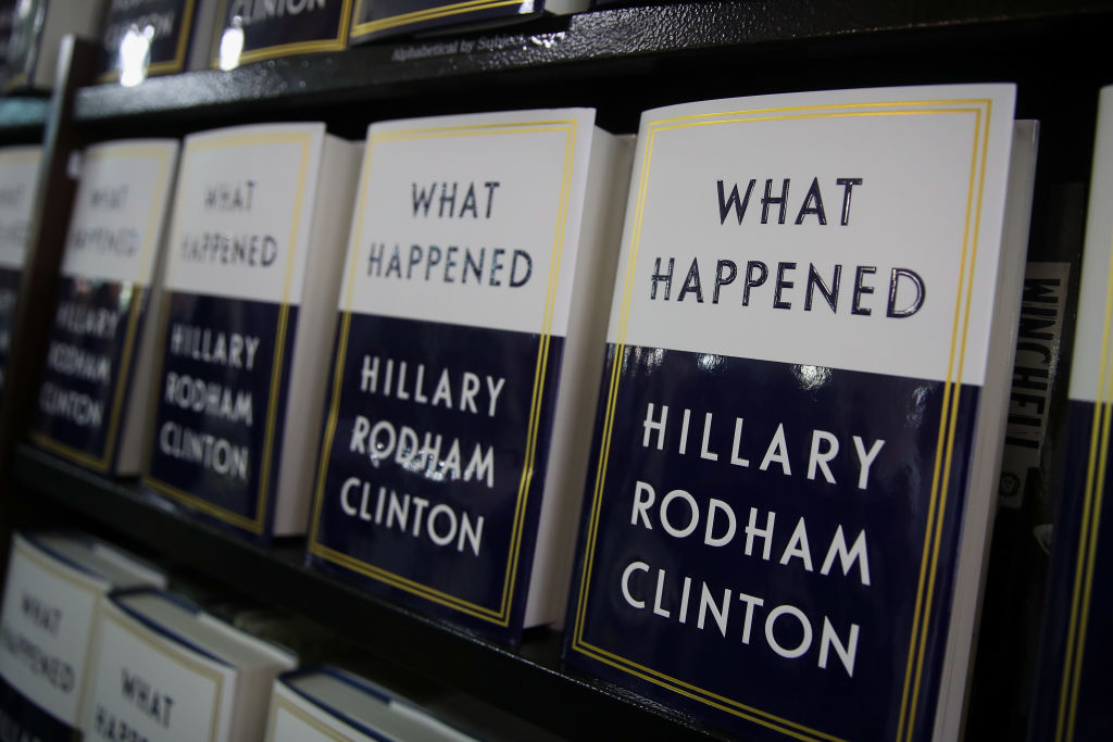 Copies of Hillary Clinton's book "What Happened" sit on a shelf
