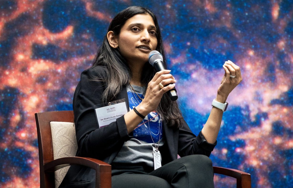 Mamta Patel Nagaraja, a fired NASA associate chief scientist for exploration and research, giving a keynote at the Department of Transportation for a White House event