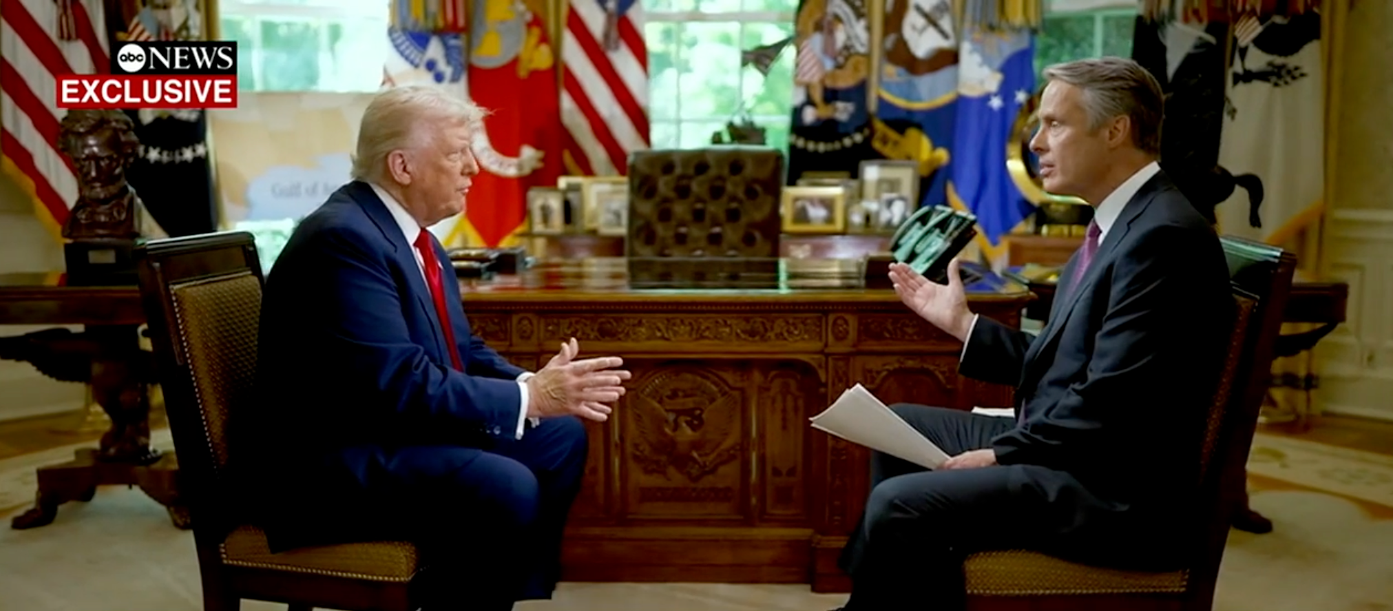 Donald Trump and Terry Moran in conversation in the extremely cluttered Oval Office during an ABC News interview.