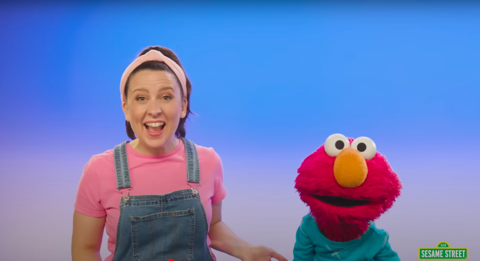 Ms. Rachel sings with Elmo